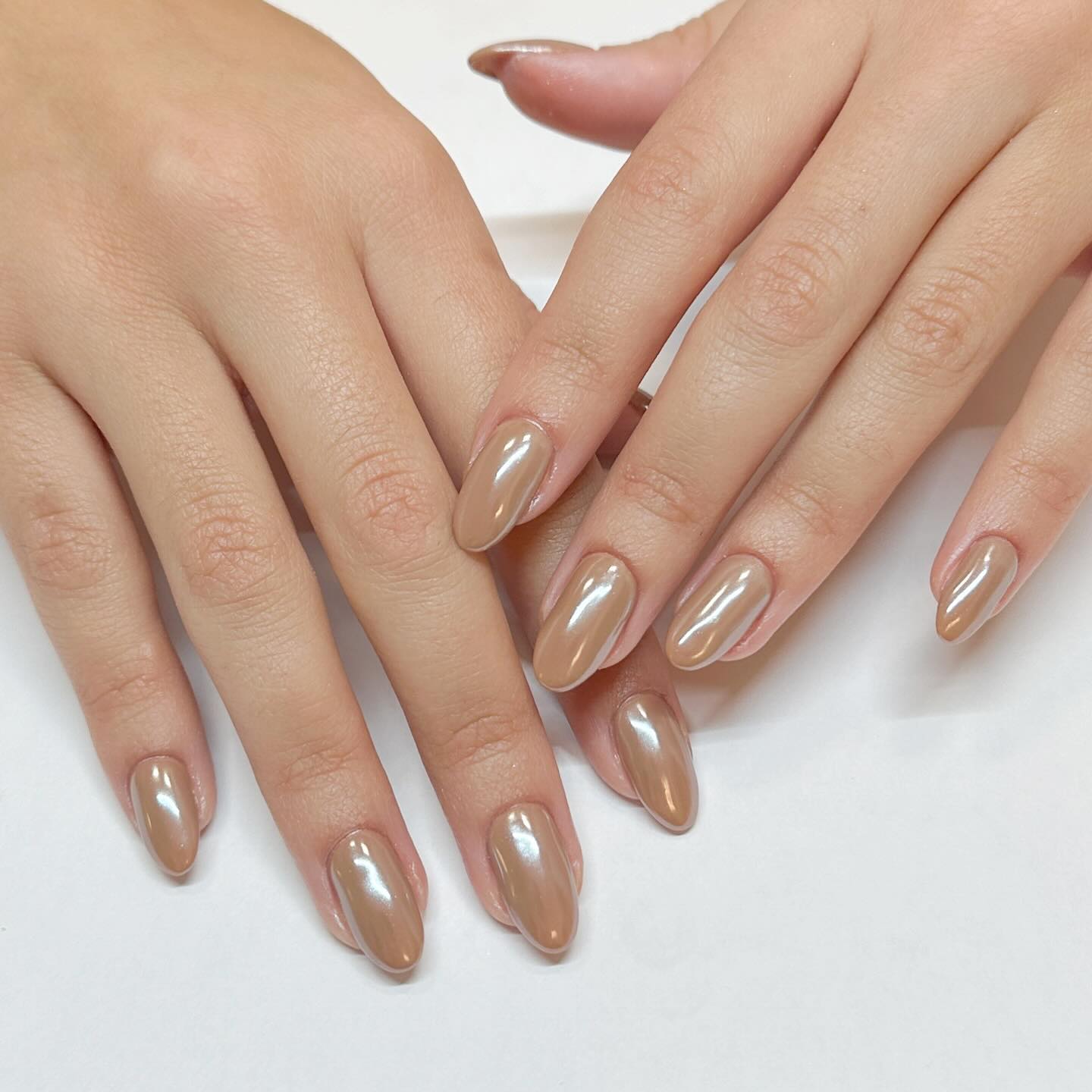 27 Chic Neutral Fall Nail Ideas You Need for 2026 27 Glossy Caramel Almond Chrome Nails