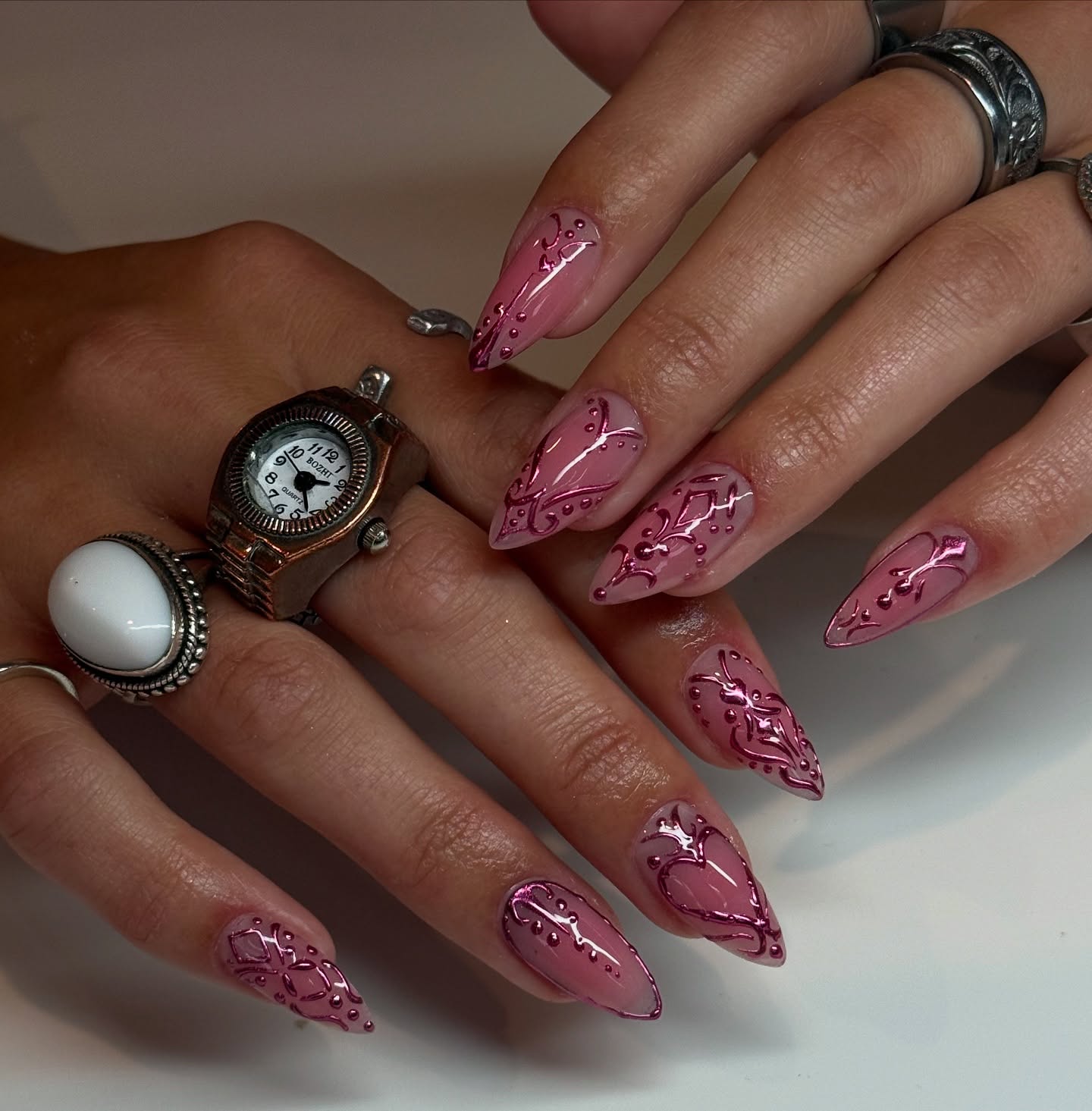 Glossy Pink Baroque Stiletto Nails