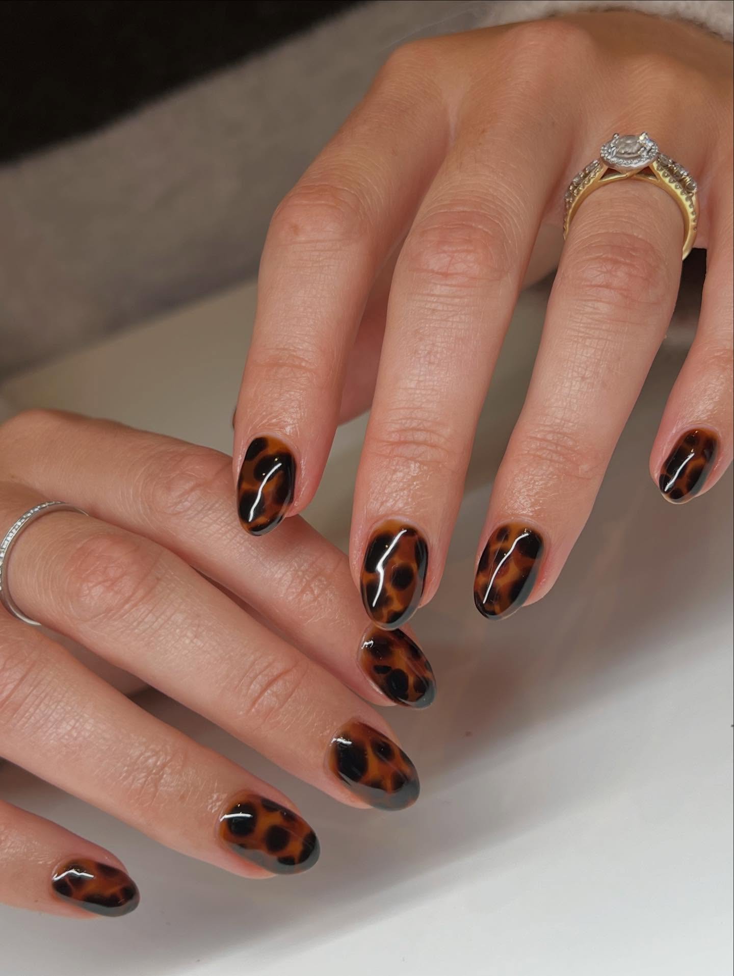 Glossy Tortoiseshell Almond Nails