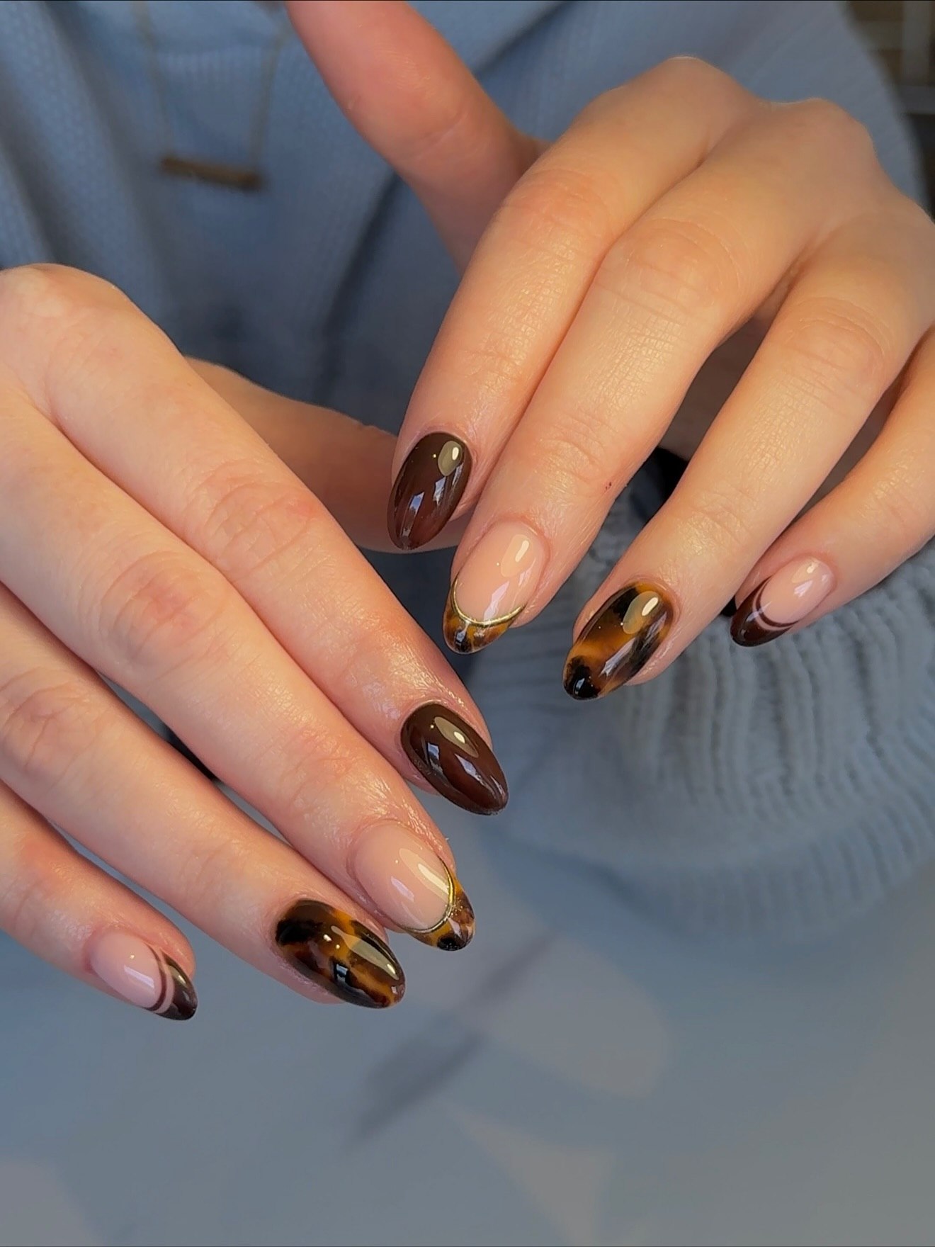 Glossy Tortoiseshell and Brown French Almond Nails