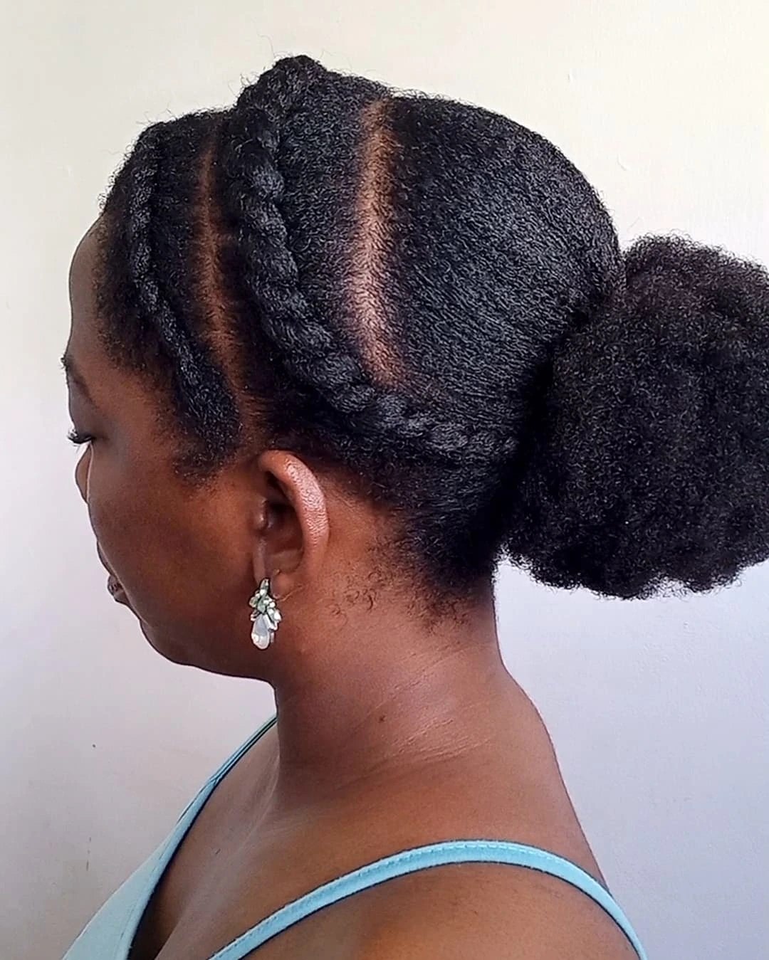 25 Protective Styles for Natural Hair Trends 2026 12 Goddess Braids With Afro Puff Bun
