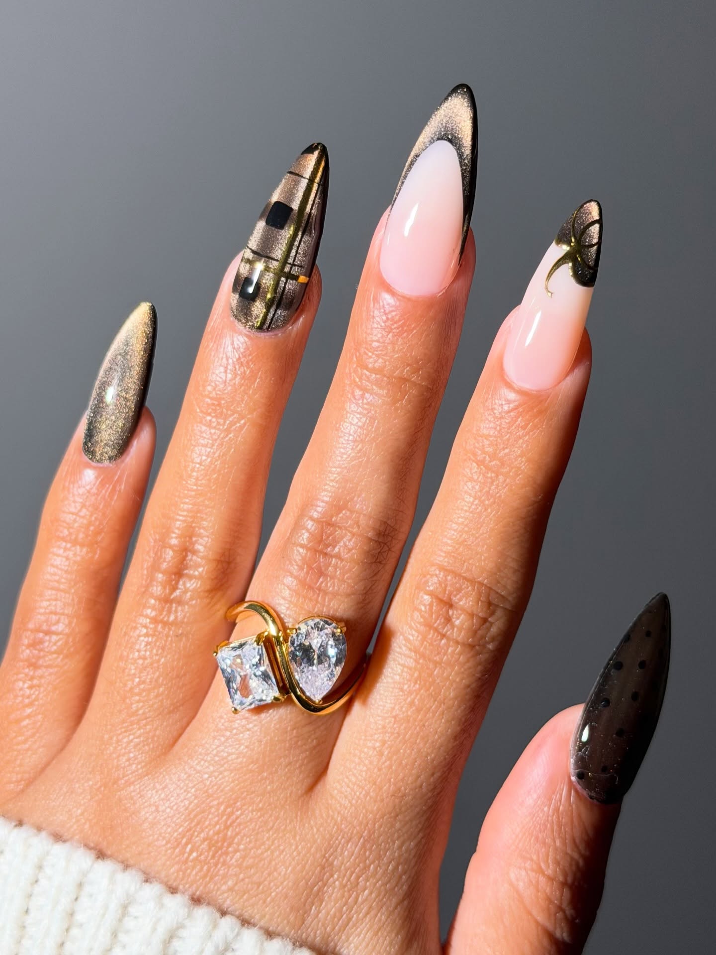 27 September Nails 2026 Trends You Must See 9 Gold Cat Eye French Tip Ombre with Black Accents