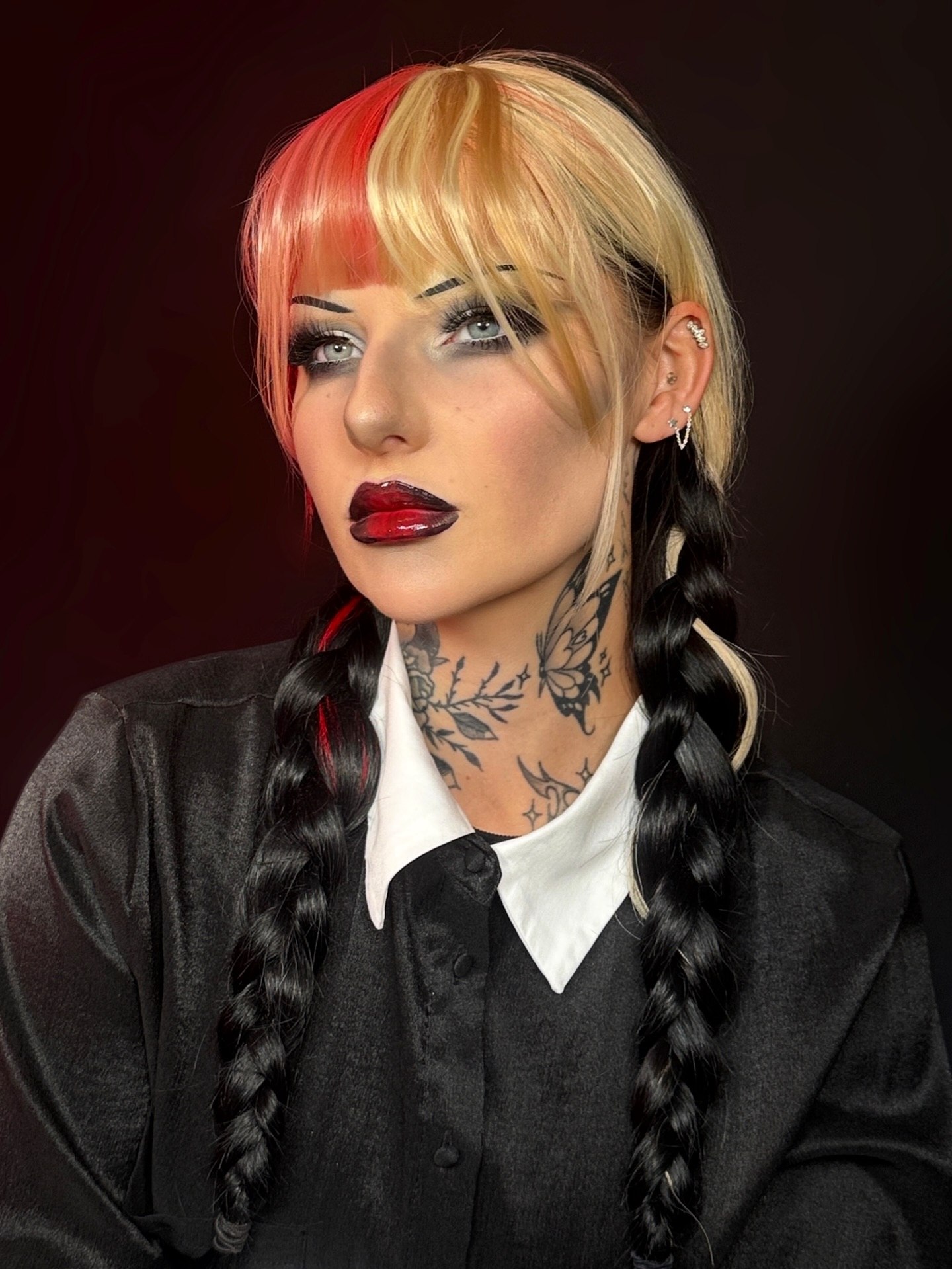 25 Spooktacular Halloween Hairstyles You Need to Try in 2026 17 Goth Inspired Two-Tone Braids With Bangs