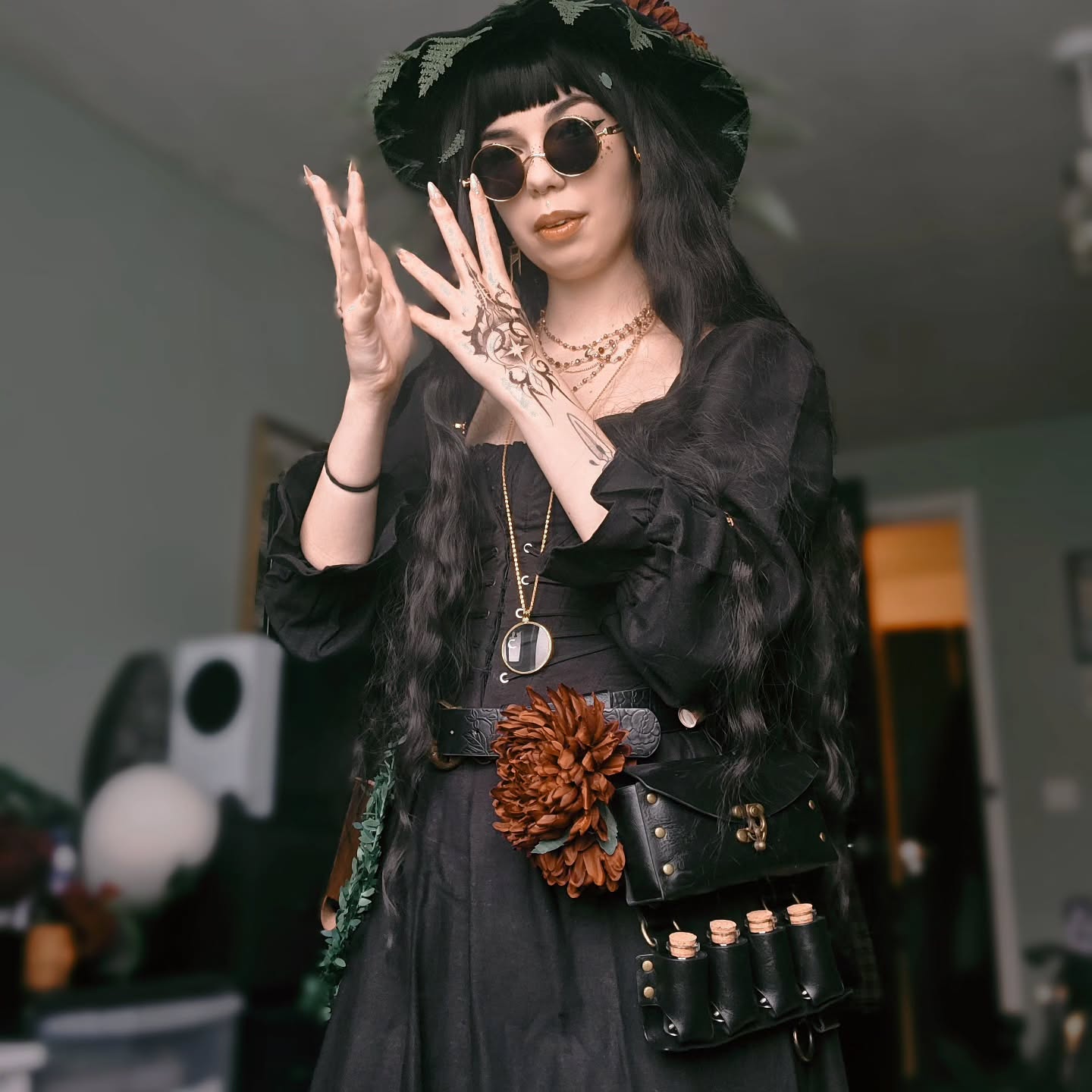 25 Witchy Outfit Ideas for 2026 14 Gothic Witchy Black Dress And Potions Belt