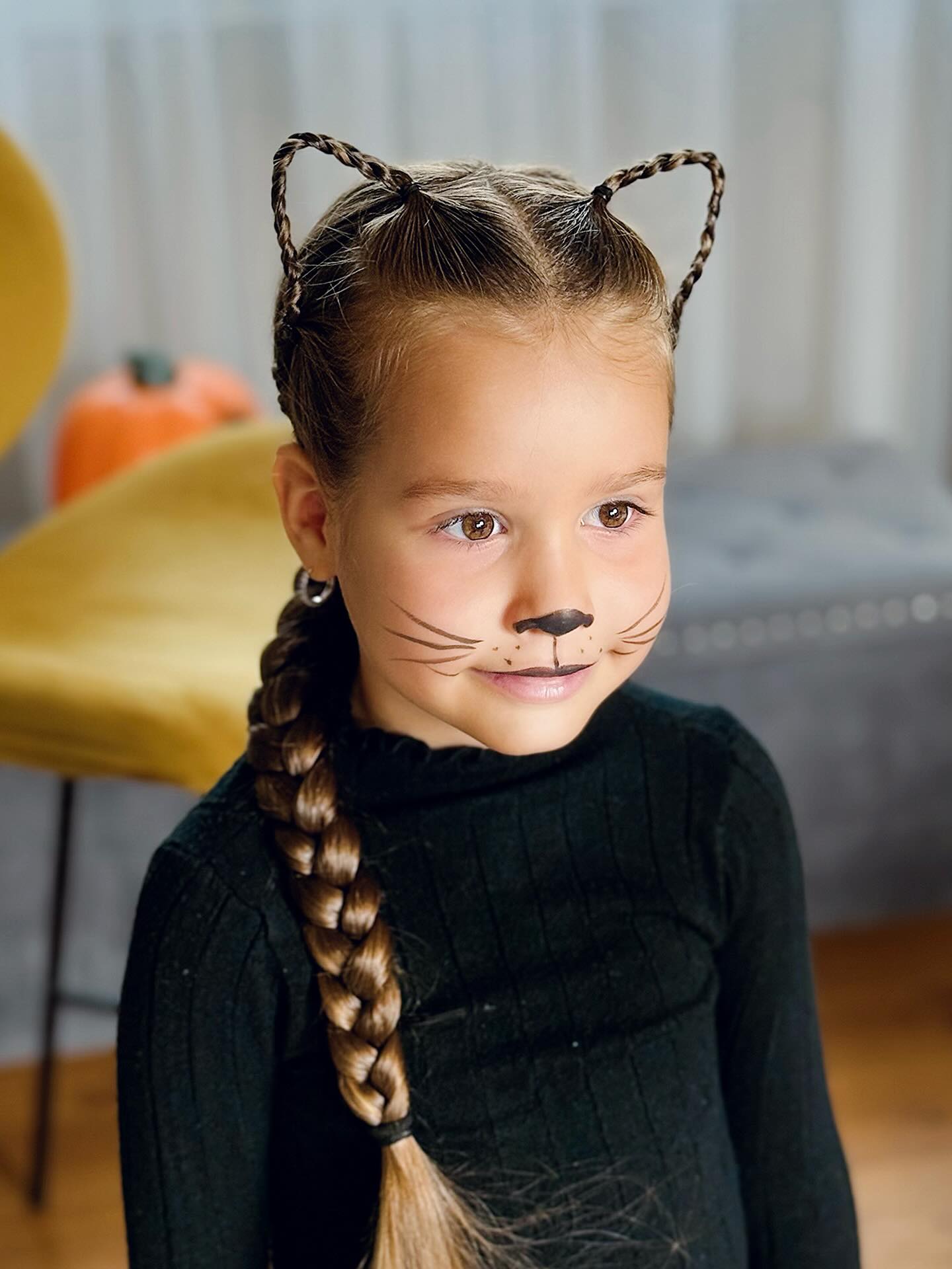 27 Spooktacular Halloween Hairstyles for Kids 2026 13 Kid's Creative Braided Cat Ears Hair