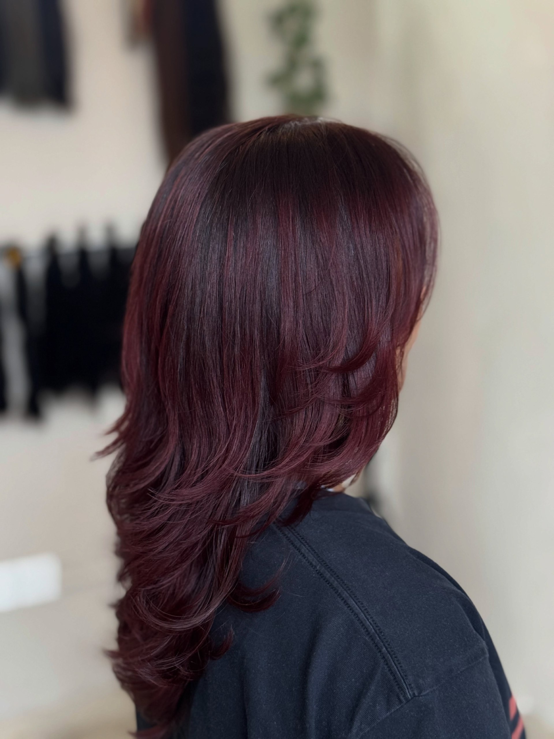 25 Cherry Cola Hair Colors Taking Over 2026 14 Layered Cherry Cola Cut With Subtle Highlights