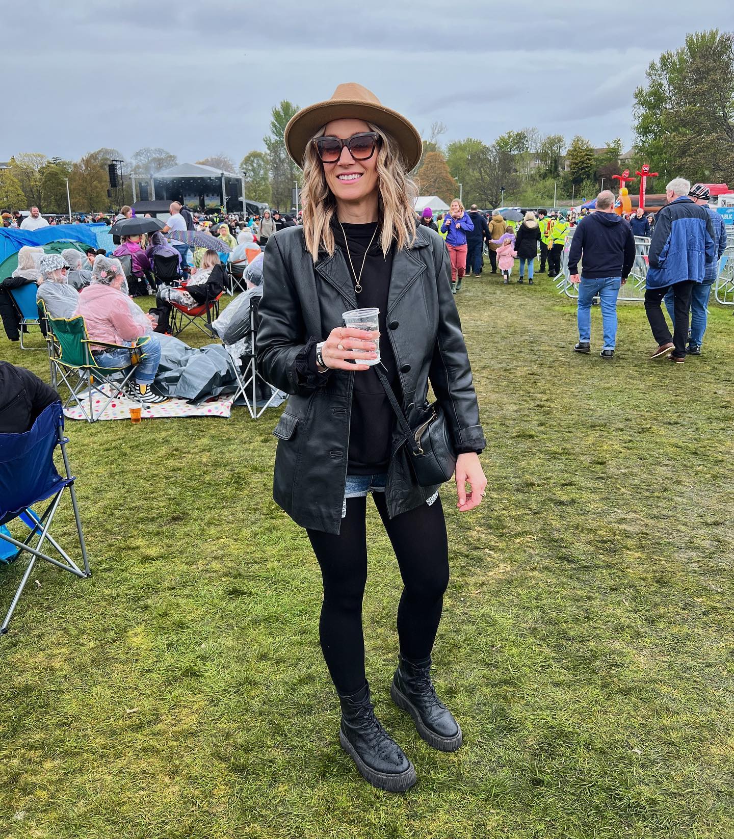 25 Fall Festival Outfits You Need for 2026 23 Leather Jacket Festival Look With Combat Boots