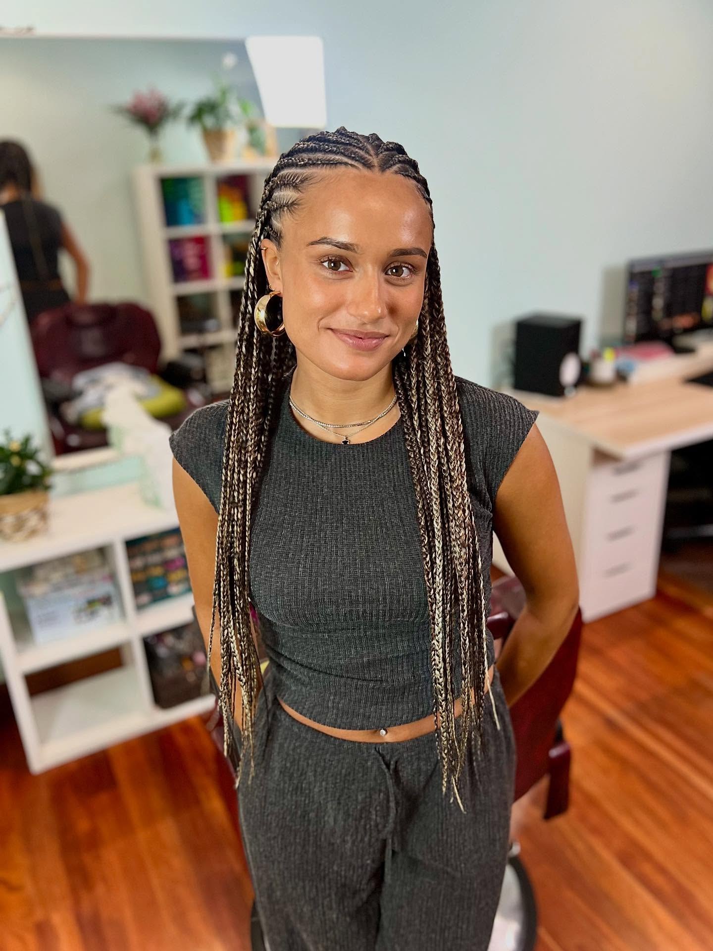 26 Stunning Fulani Braids Hairstyles for 2026 8 Long Two-Tone Fulani Braids With Golden Accents