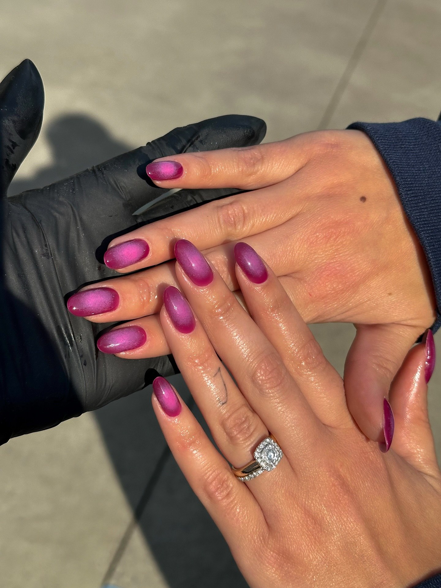 Magenta Cat Eye Almond Nails
