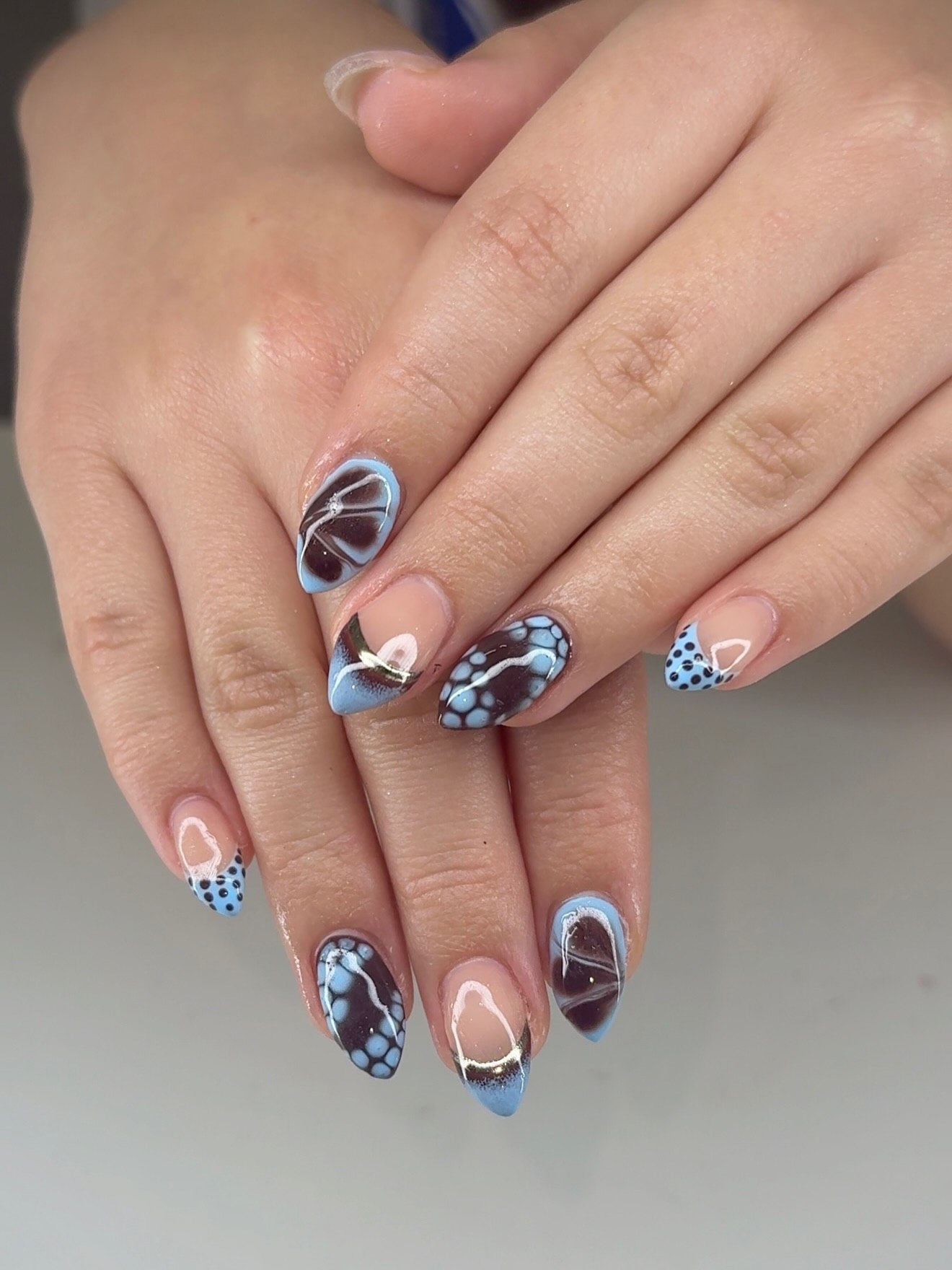 25 Fall Nail Ideas You Need to Try in 2026 14 Matte Blue Marble & Polka Dot French Tips