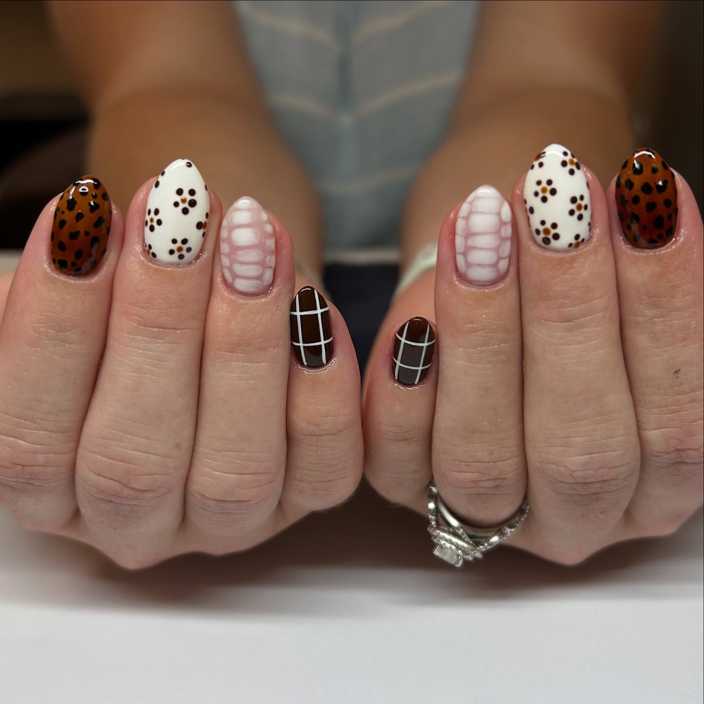 27 Chic Neutral Fall Nail Ideas You Need for 2026 7 Mixed Animal Print and Grid Fall Nails