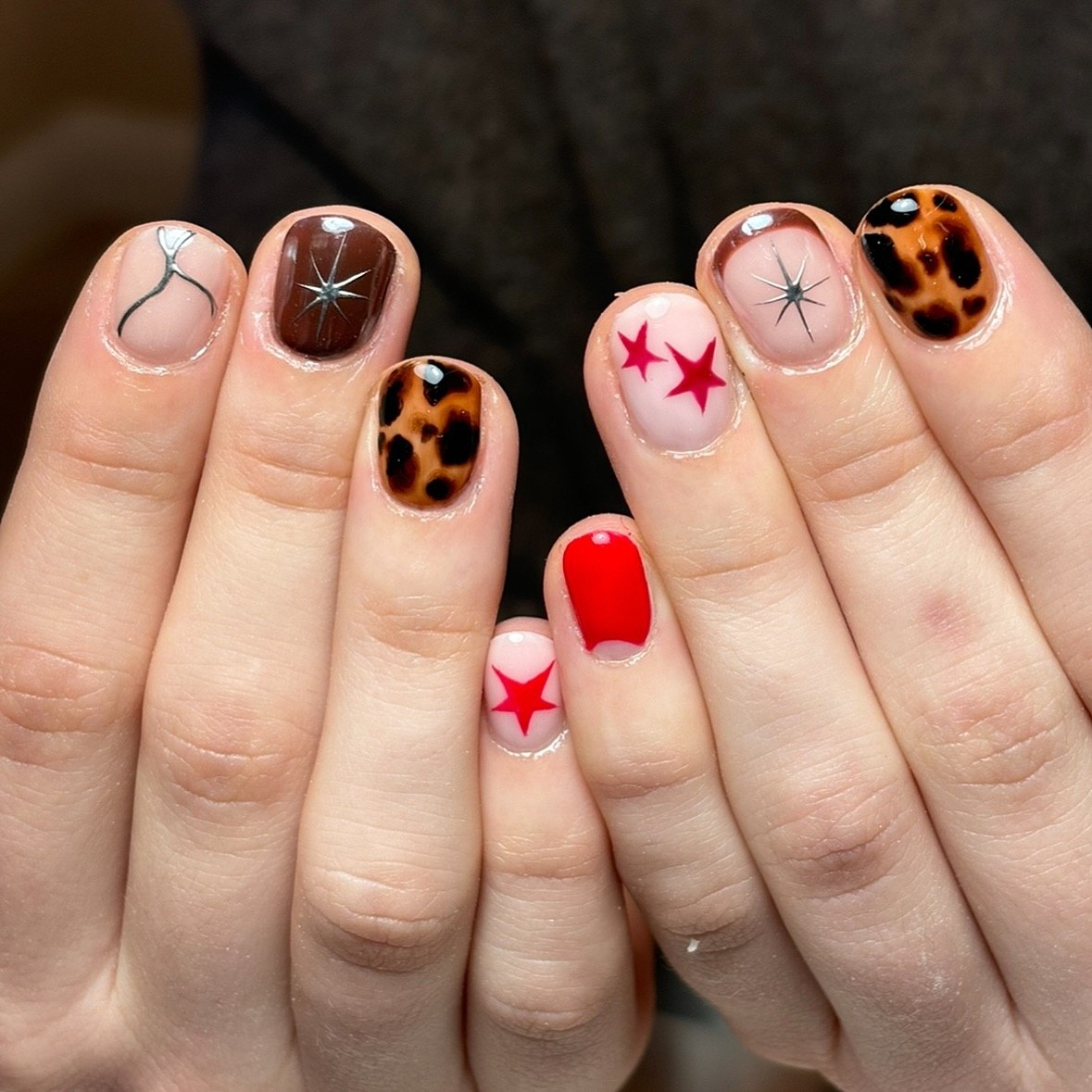27 Must-Try Short Fall Nail Ideas for 2026 27 Mixed Media Short Nails With Stars & Leopard