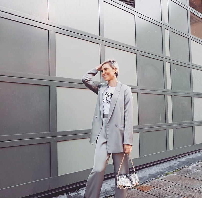 25 Fall Party Outfit Ideas You Need for 2026 19 Monochrome Satin Suit With Graphic Tee