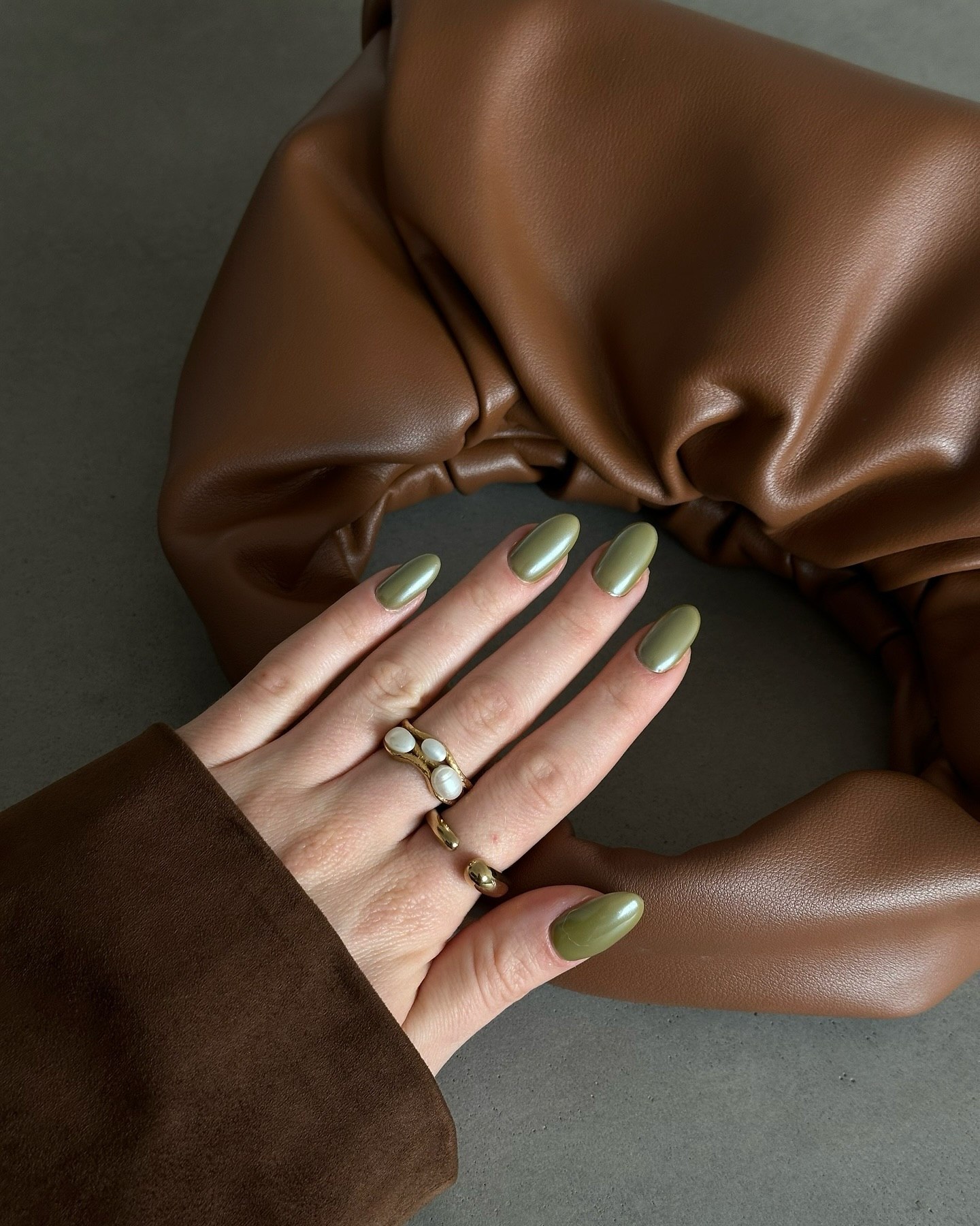 27 Chic Neutral Fall Nail Ideas You Need for 2026 3 Muted Olive Green Glossy Almond Nails