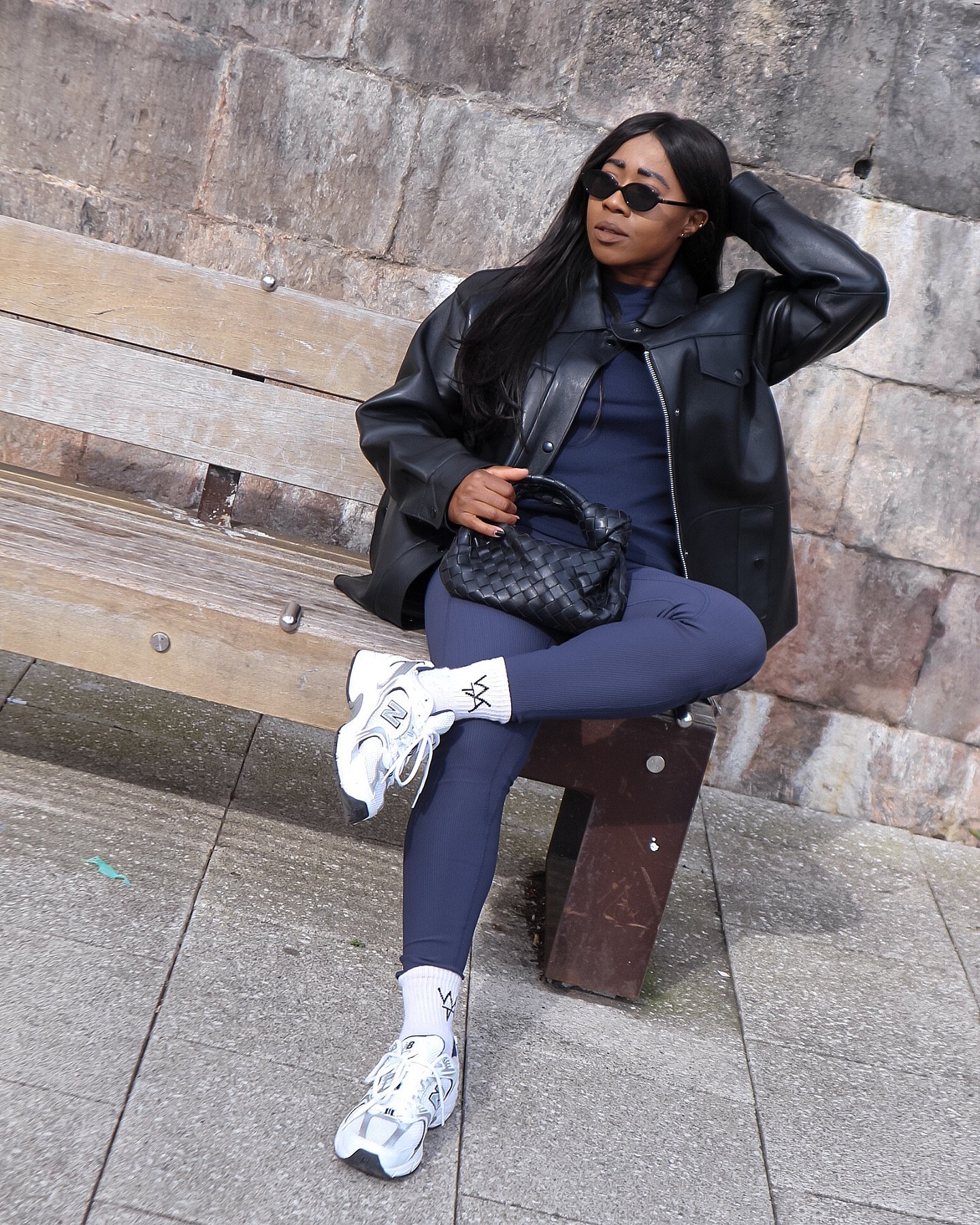 27 Leggings Outfits for 2026 You Need to See Now 16 Navy Leggings With Oversized Leather Jacket