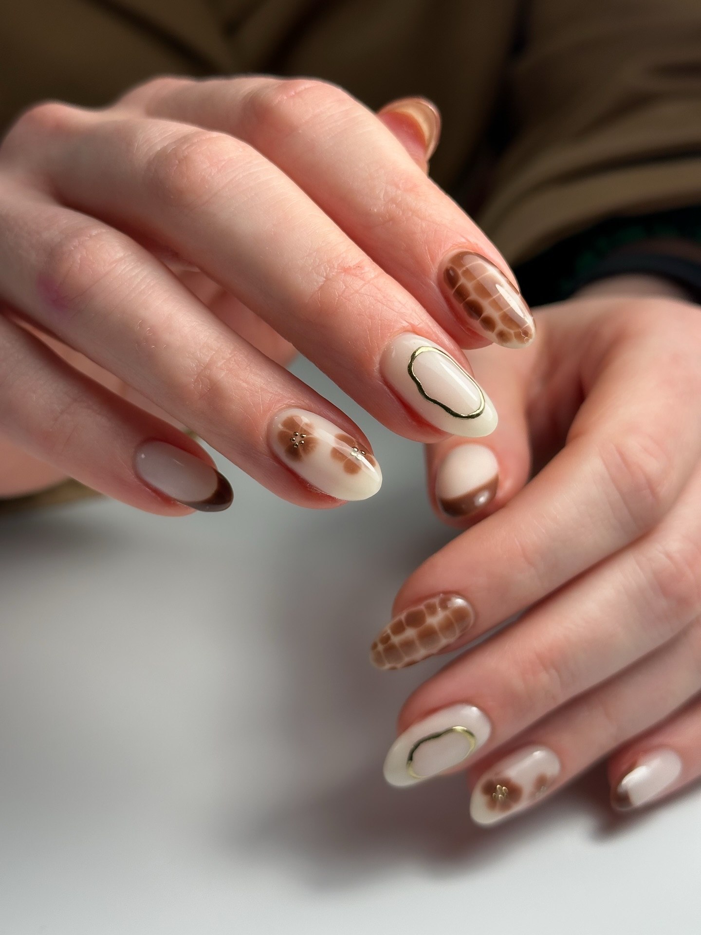 27 Chic Neutral Fall Nail Ideas You Need for 2026 6 Neutral French Tips with Chic Animal Print Accents
