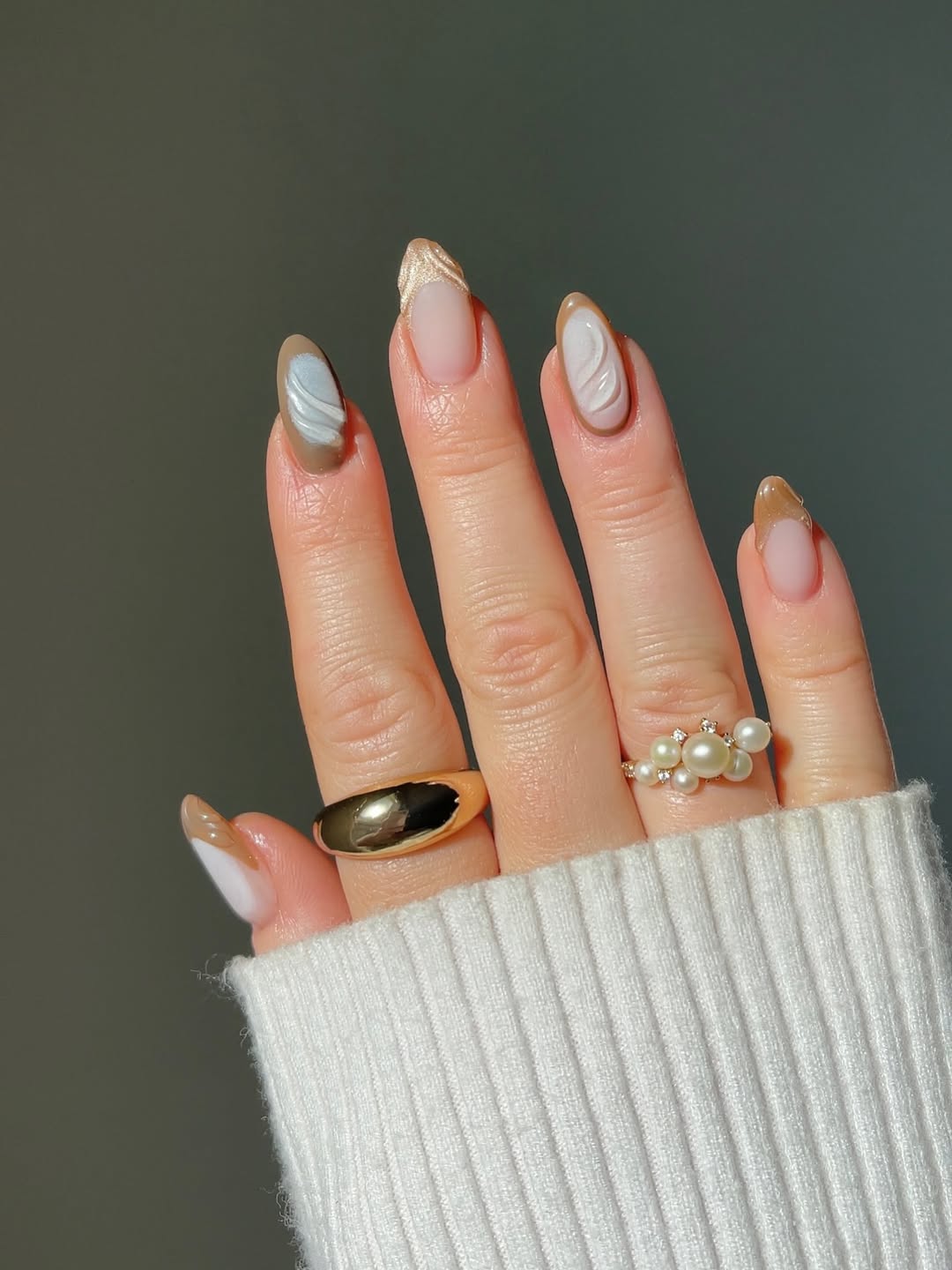 27 Chic Neutral Fall Nail Ideas You Need for 2026 11 Neutral Swirl Almond French Tips with Gold Accent