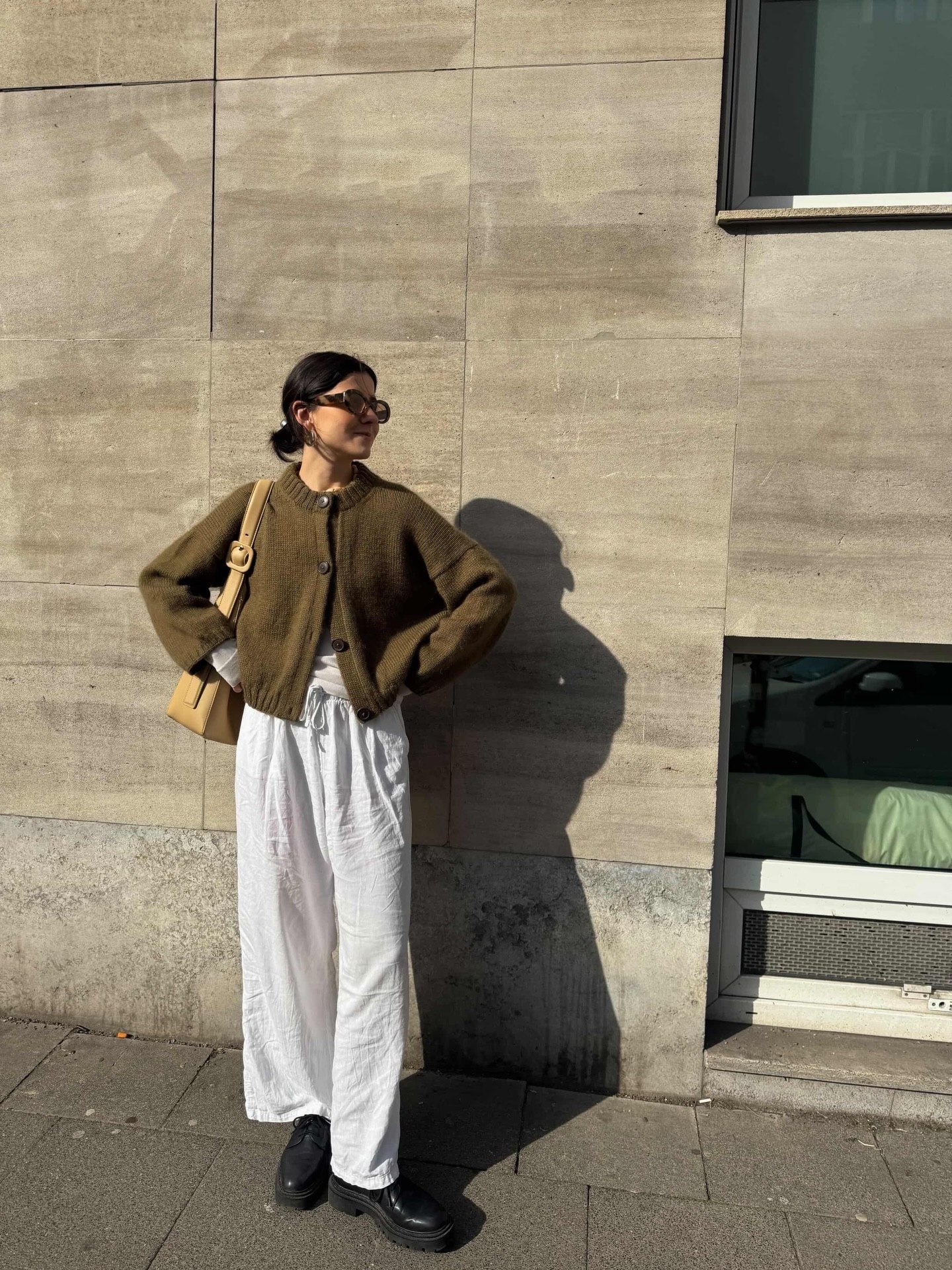 27 Cardigan Outfit Ideas You Need for 2026 9 Olive Cardigan With White Linen Trousers and Chunky Loafers