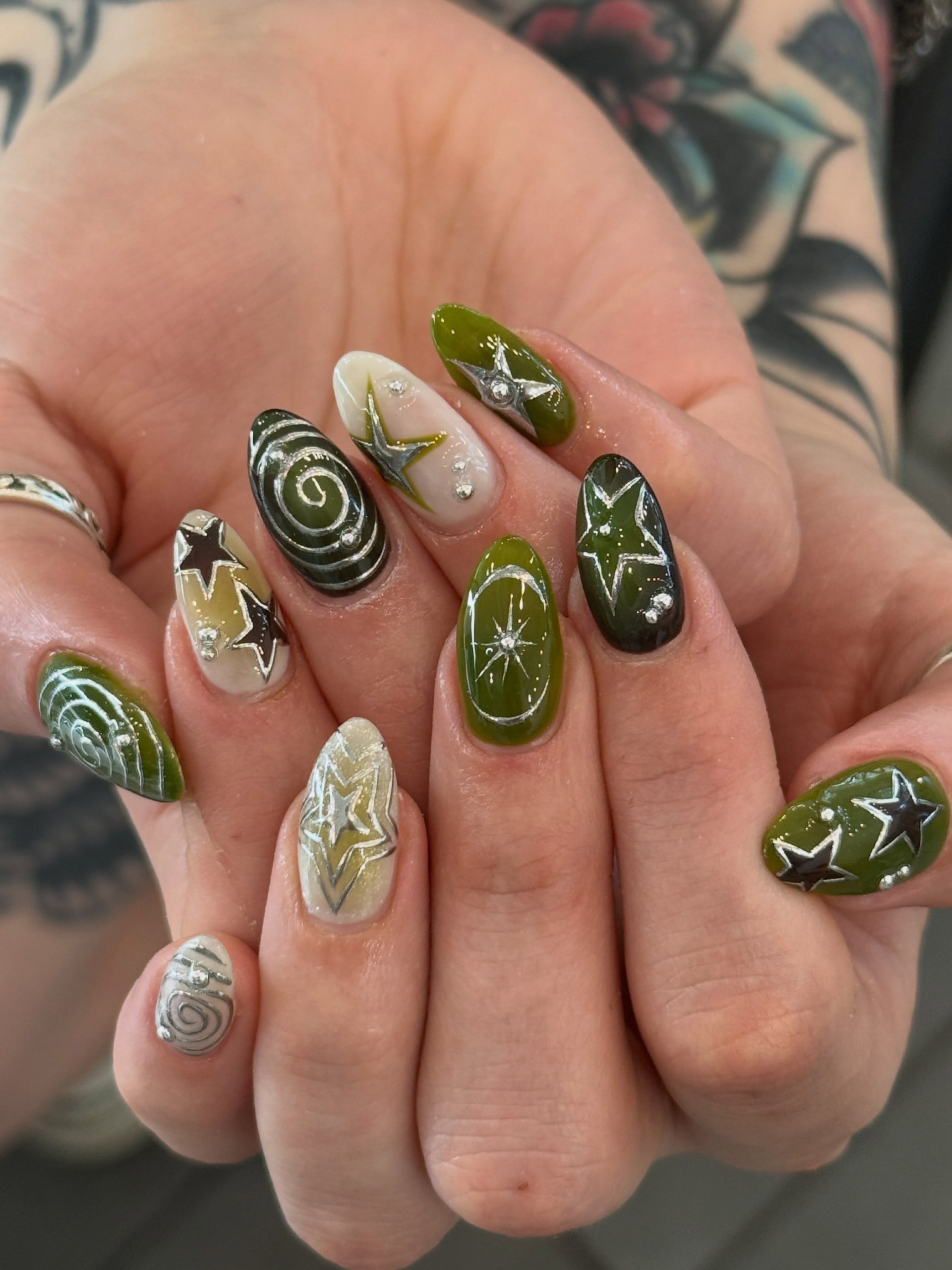 Olive Green Starry Night Almond Nails