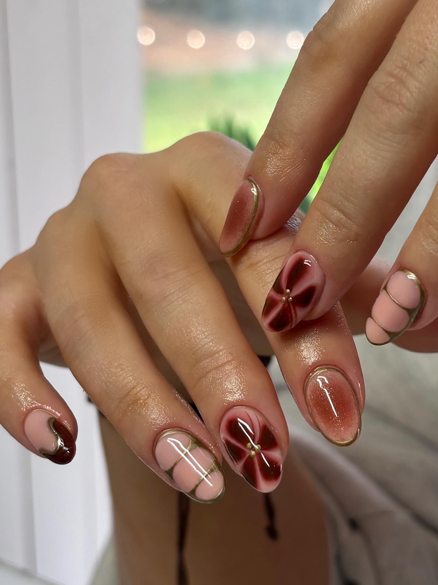 27 September Nails 2026 Trends You Must See 27 Ombre Flower Almond Nails with Gold Accents