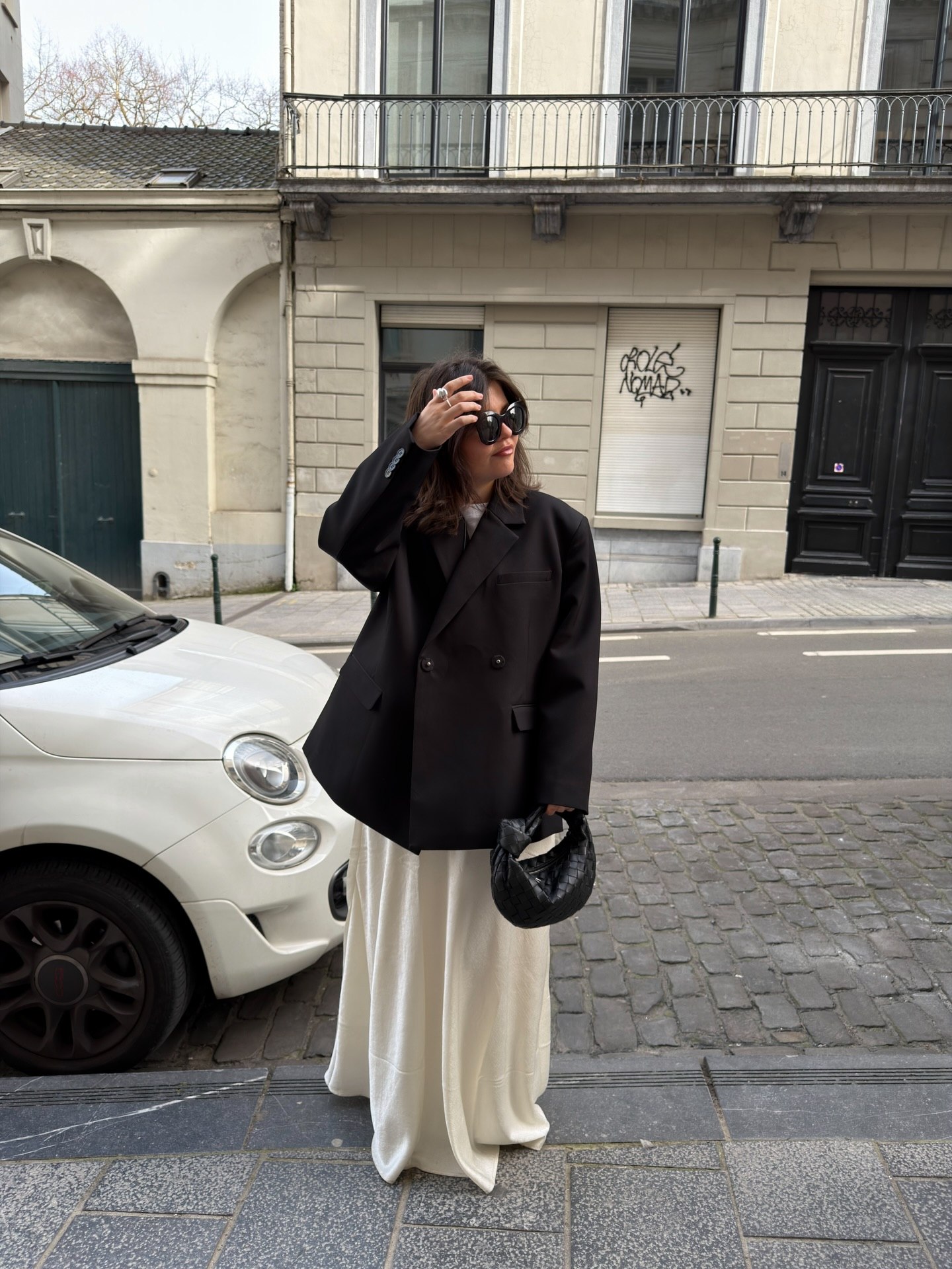26 Blazer Outfit Ideas You Need for 2026 12 Oversized Black Blazer With Cream Satin Maxi Skirt