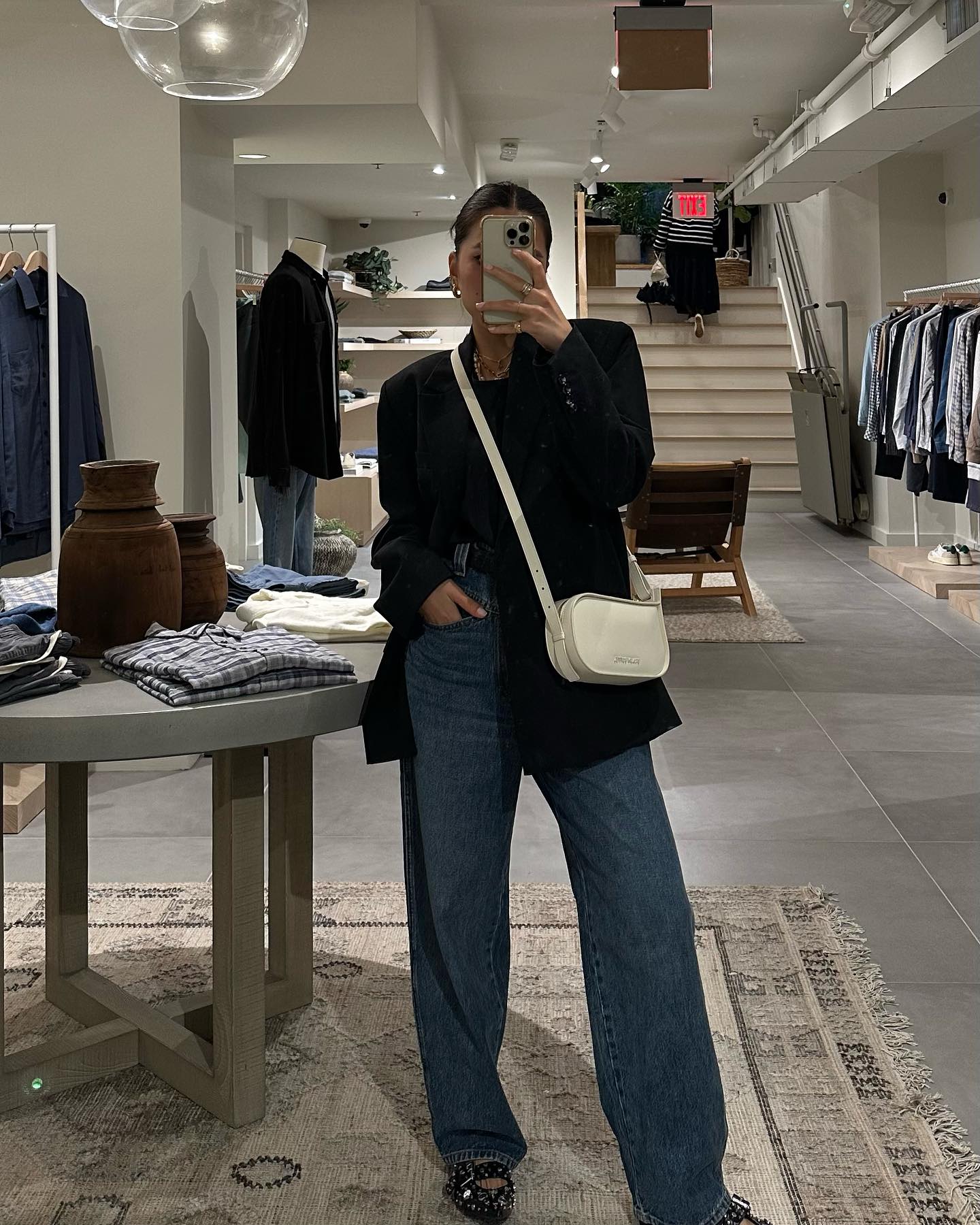 30 Transitional Fall Outfits You Need Now 11 Oversized Blazer With Wide Leg Jeans And Studded Slides