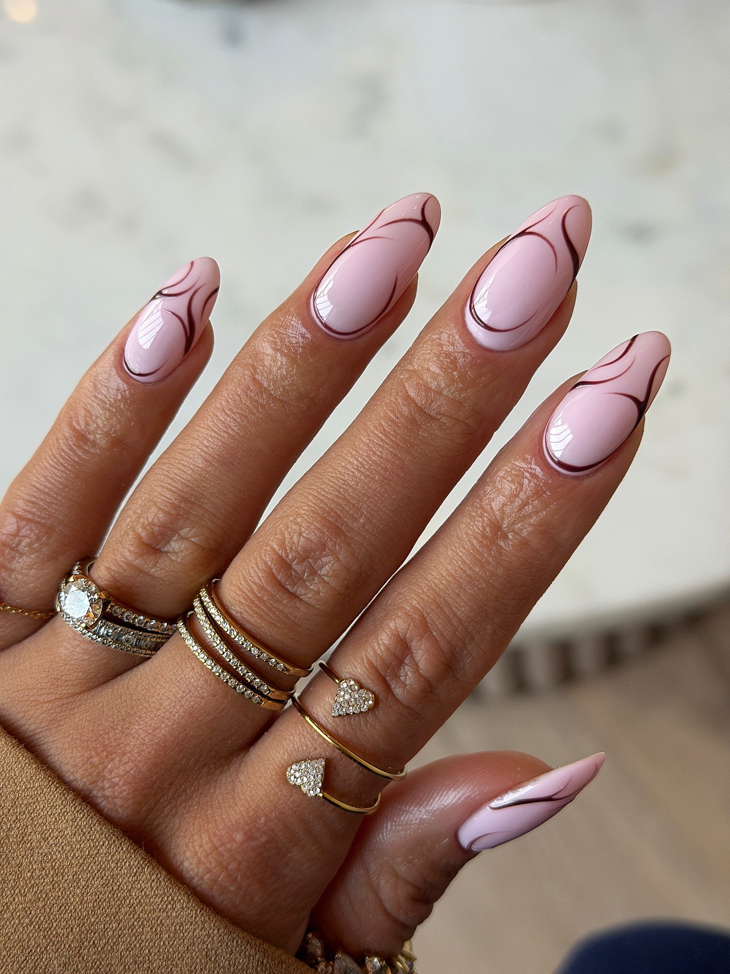 Pastel Pink Swirl Almond Nails