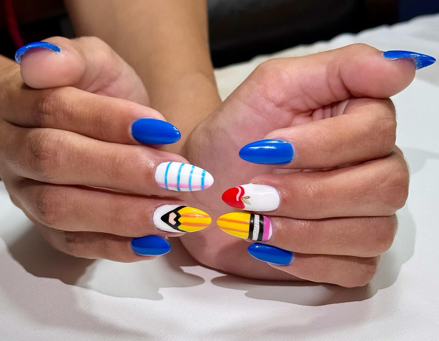 25 Back to School Nail Ideas for 2026 15 Pencil And Apple Back To School Almond Nails