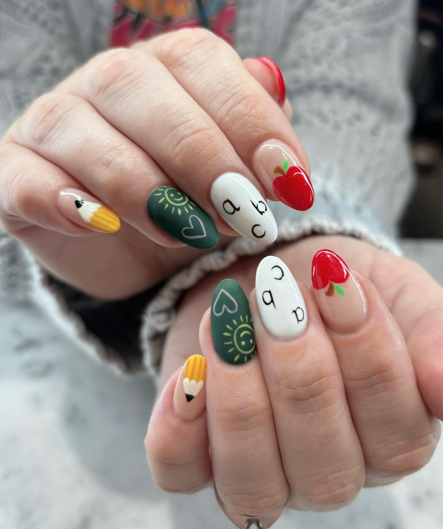 25 Back to School Nail Ideas for 2026 4 Pencil and Apple Back to School Almond Nails