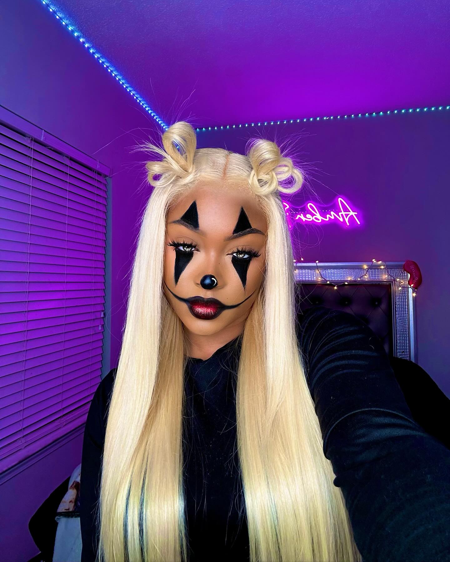 25 Spooktacular Halloween Hairstyles You Need to Try in 2026 20 Platinum Blonde Space Buns Clown Halloween Style