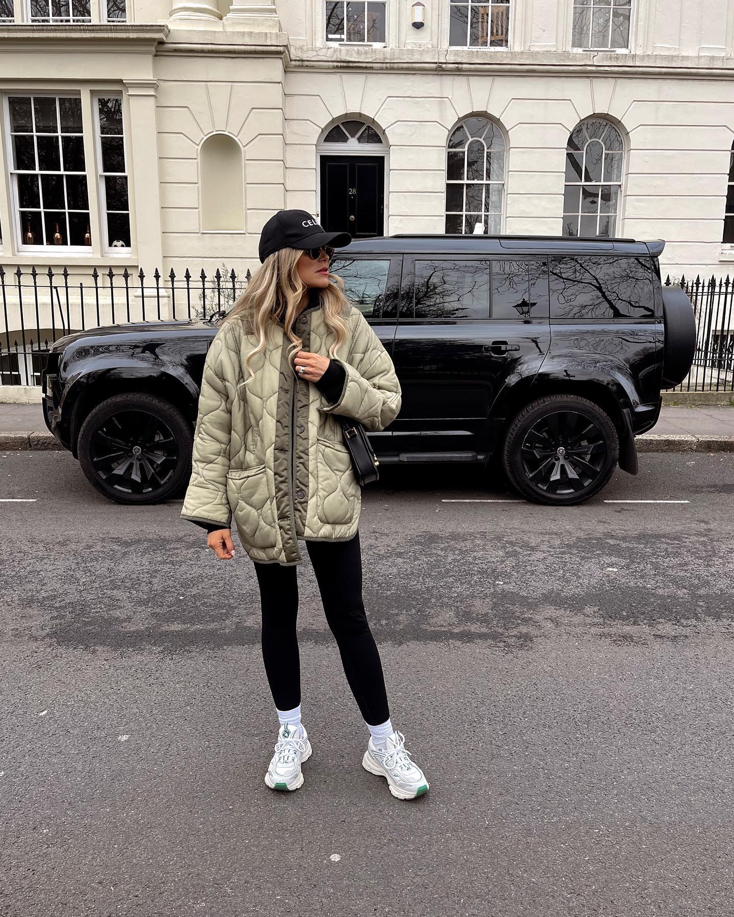 27 Leggings Outfits for 2026 You Need to See Now 4 Quilted Jacket With Black Leggings and Sneakers