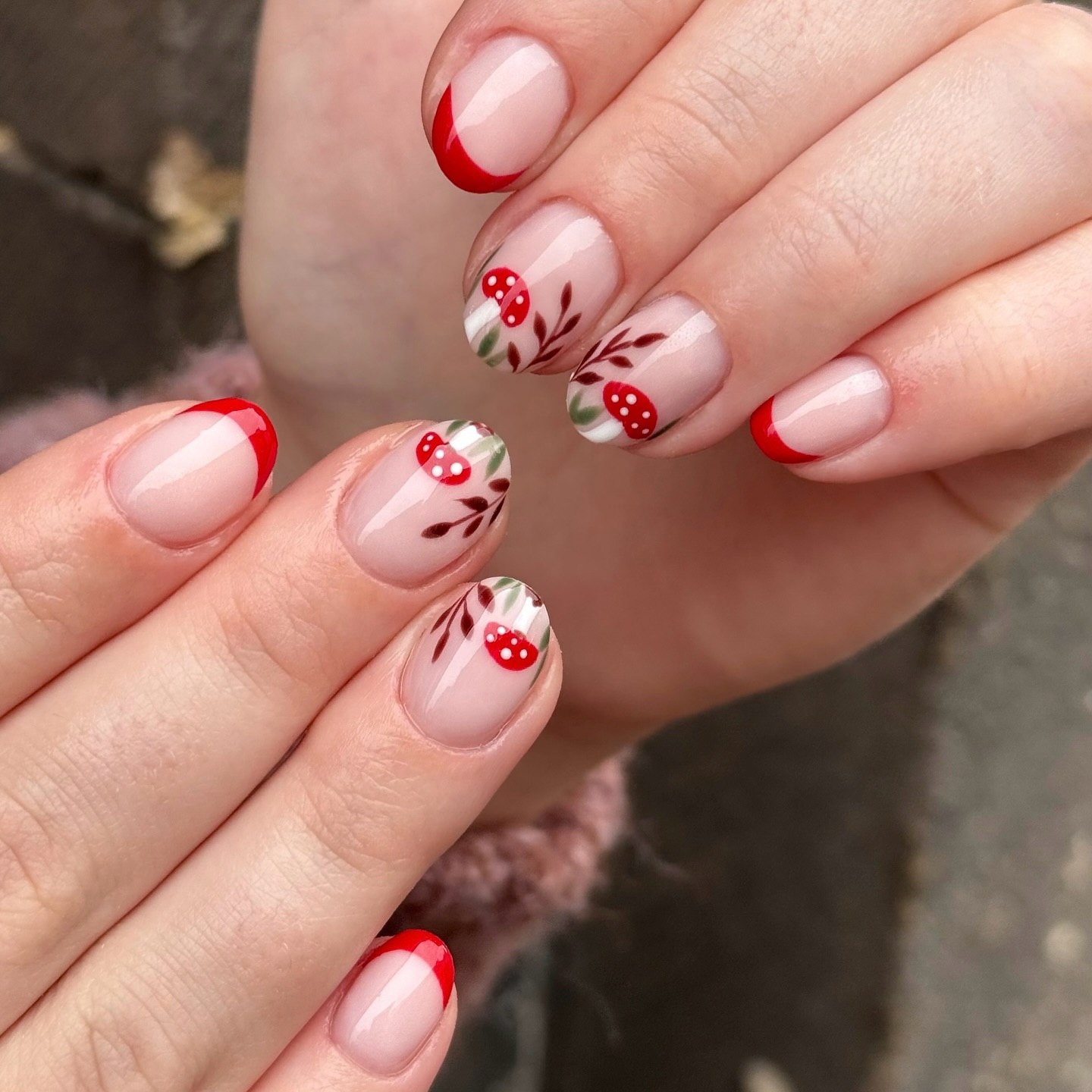 27 Must-Try Short Fall Nail Ideas for 2026 17 Red Mushroom French Tip Short Oval Nails