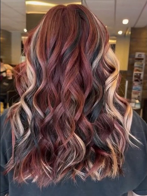 29 Calico Hair Color Styles You Need to See for 2026 31 Red Toned Balayage With Blonde & Black Streaks