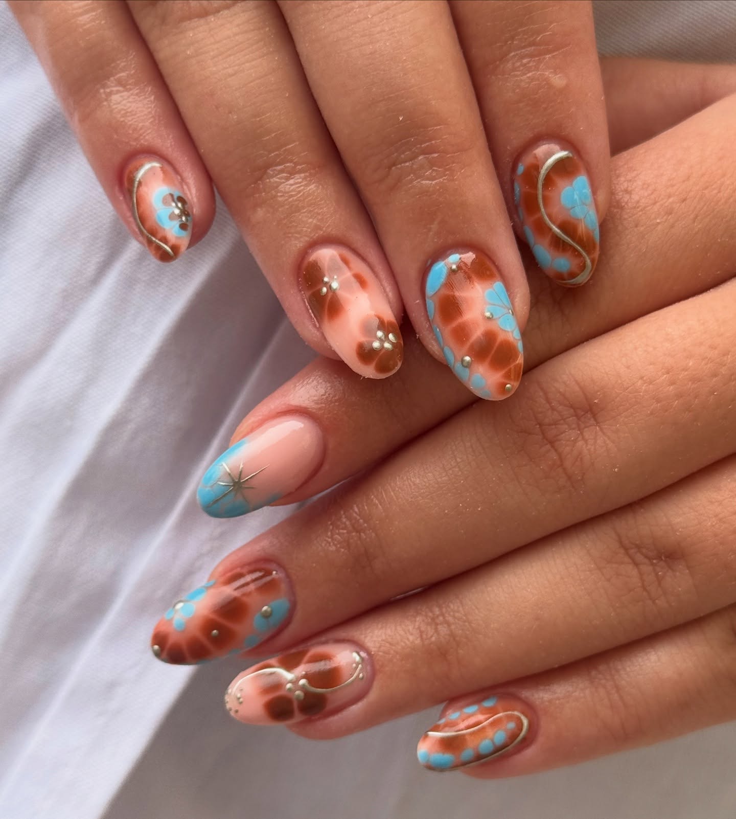 27 September Nails 2026 Trends You Must See 21 Retro Floral Swirl Almond Nails