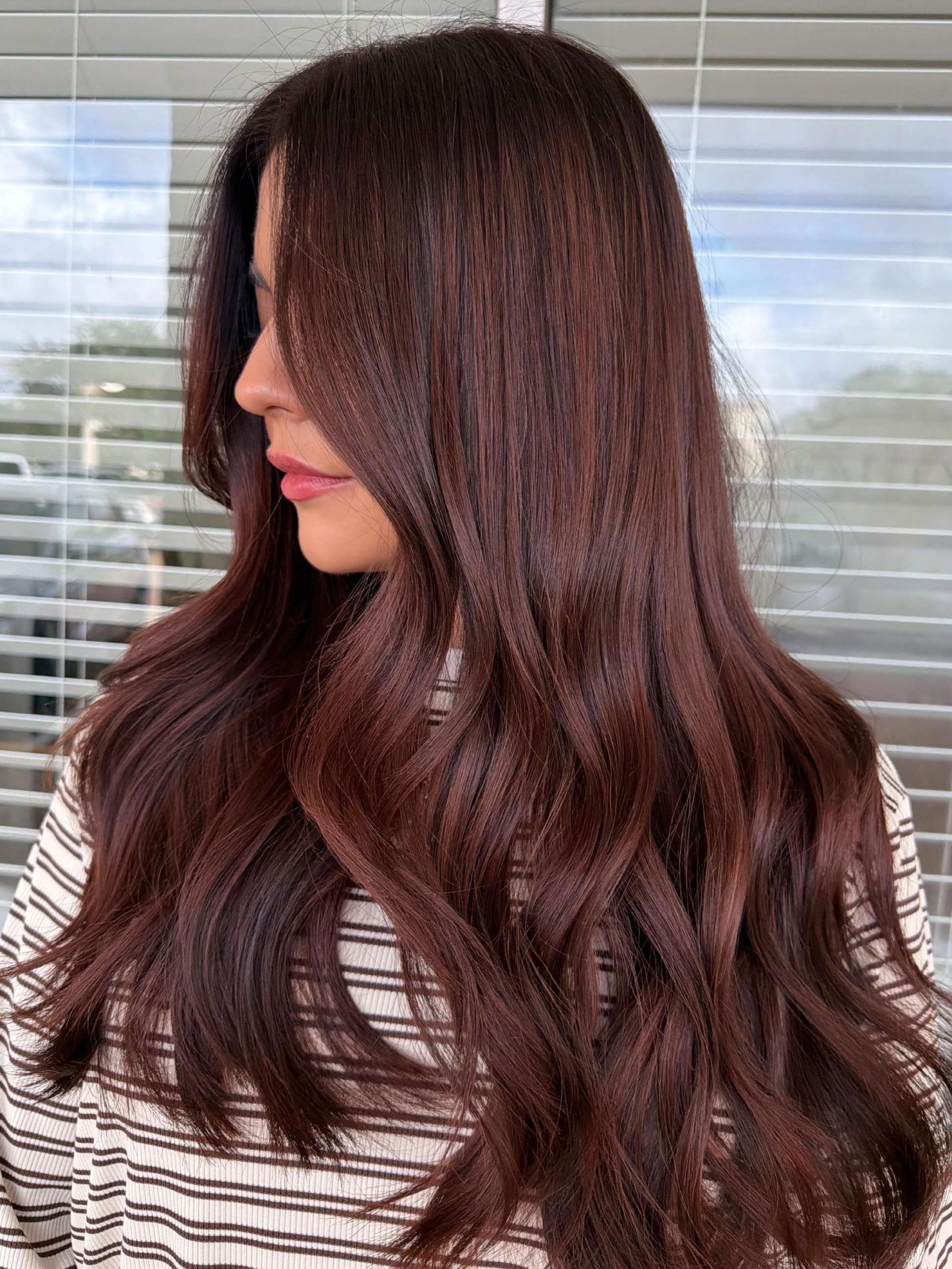 27 Stunning Fall Hair Colors for Brunettes 2026 9 Rich Cherry Cola Brunette With Loose Waves