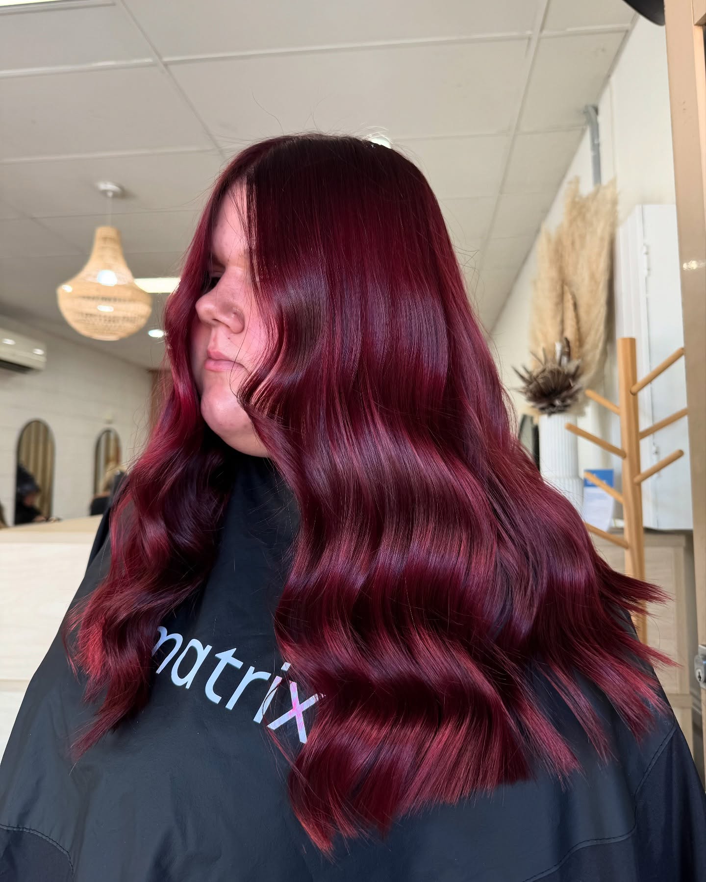 25 Cherry Cola Hair Colors Taking Over 2026 22 Rich Cherry Red Glossy Waves