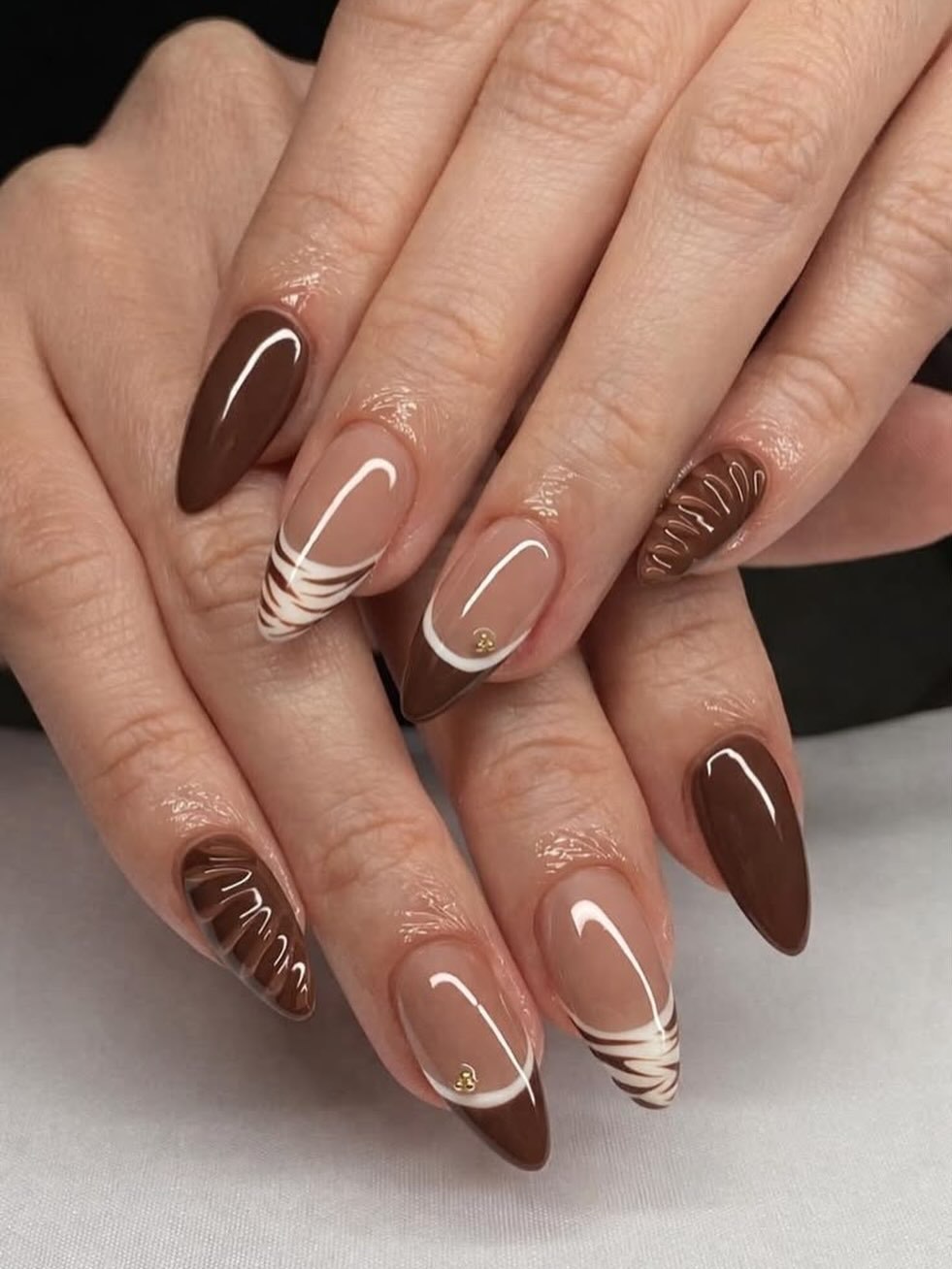 27 Chic Neutral Fall Nail Ideas You Need for 2026 20 Rich Chocolate Swirl Almond French Nails