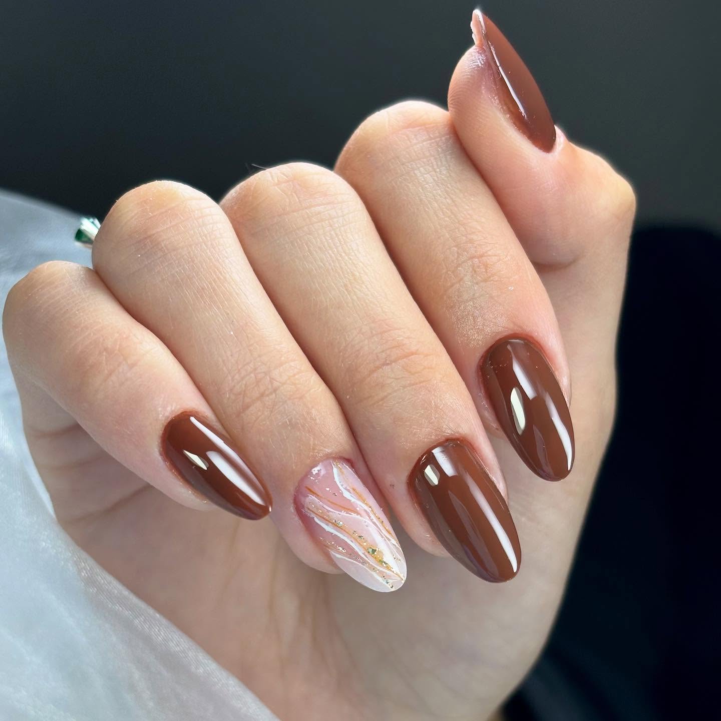 27 Chic Neutral Fall Nail Ideas You Need for 2026 24 Rich Chocolate Swirl Almond Nails