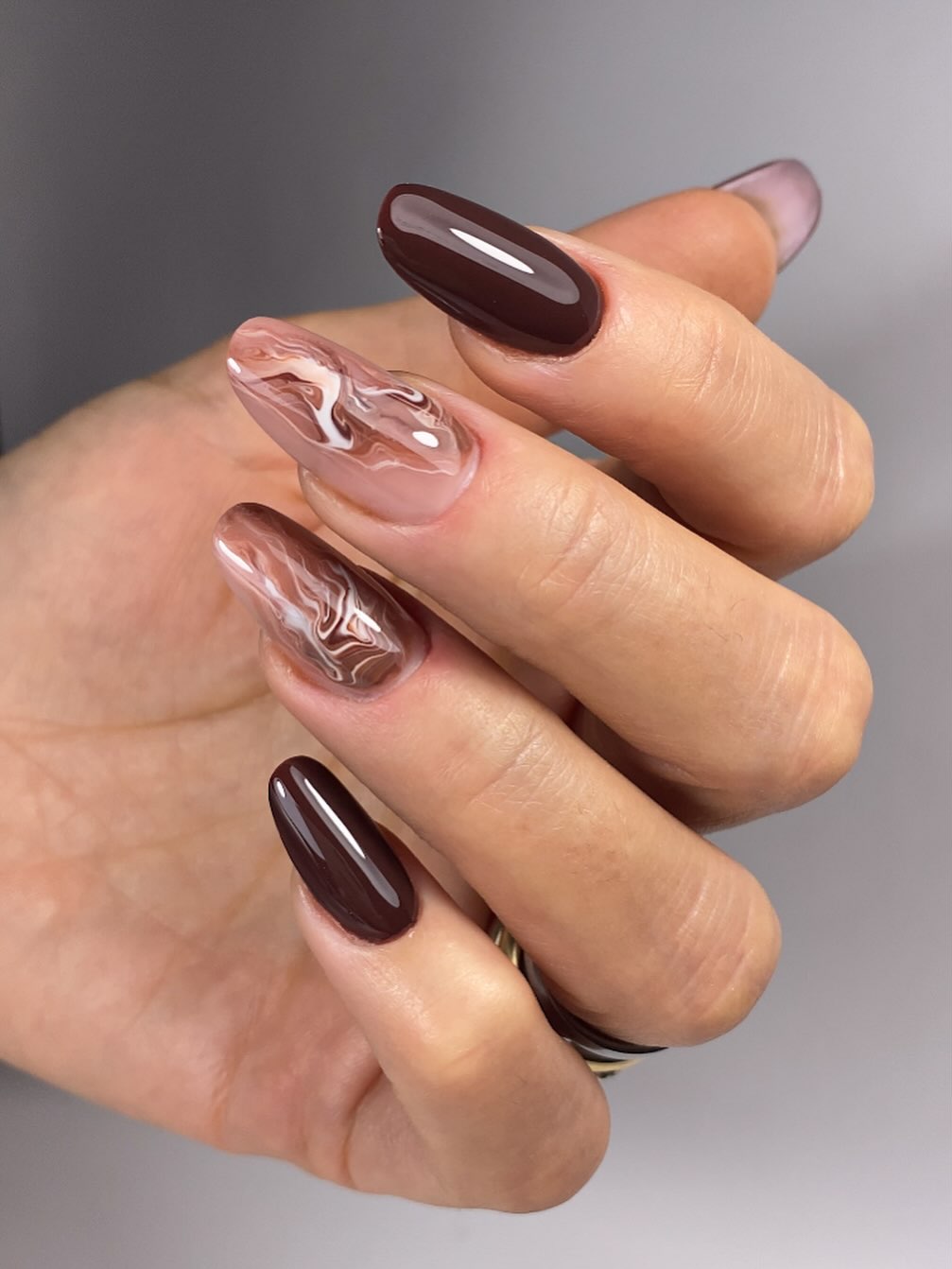 Rich Mocha Swirl and Solid Glossy Almond Nails