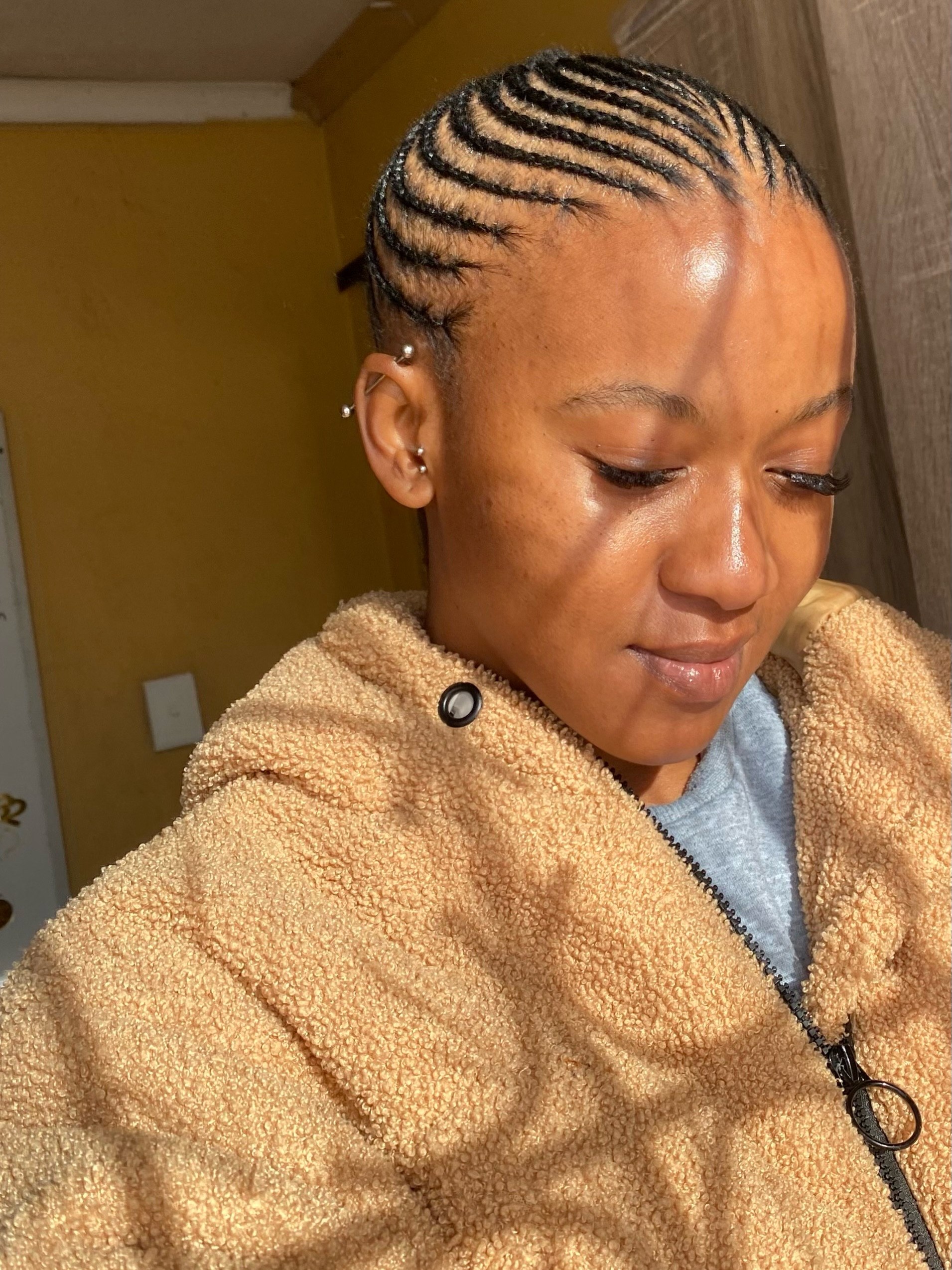 25 Stunning Type 4c Hairstyles You’ll See Everywhere in 2026 7 Sleek Cornrows With Defined Edges