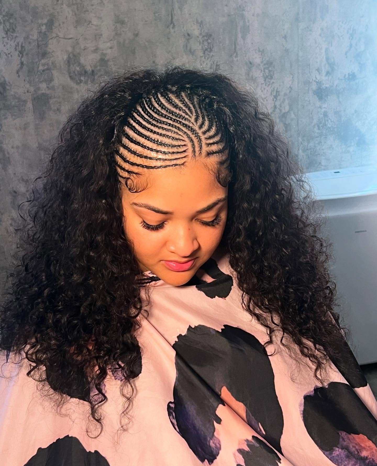 25 Fall Braids for 2026 You Need to Try Now 11 Sleek Cornrows With Voluminous Natural Curls