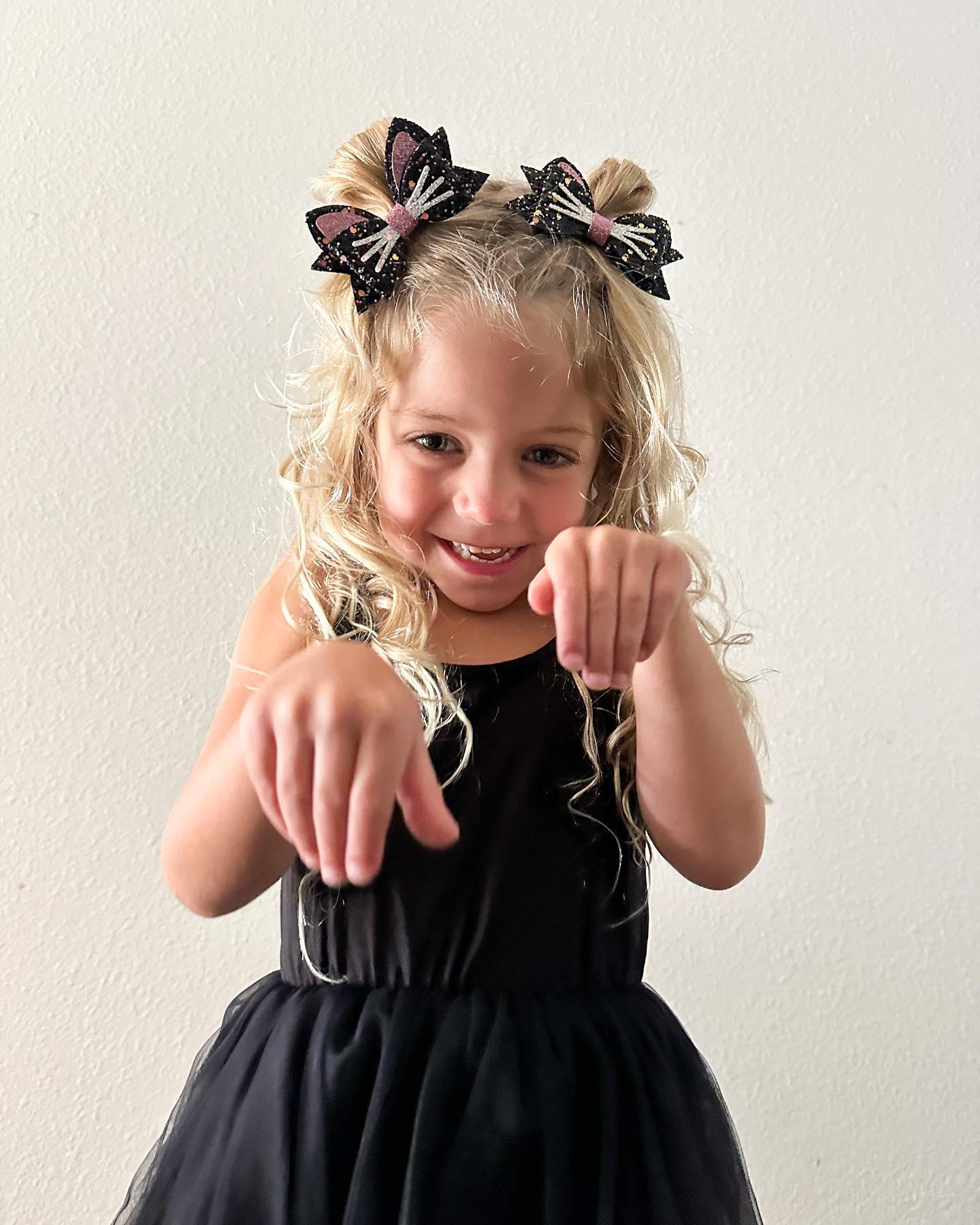 27 Spooktacular Halloween Hairstyles for Kids 2026 29 Sparkly Cat Ear Pigtail Buns for Halloween
