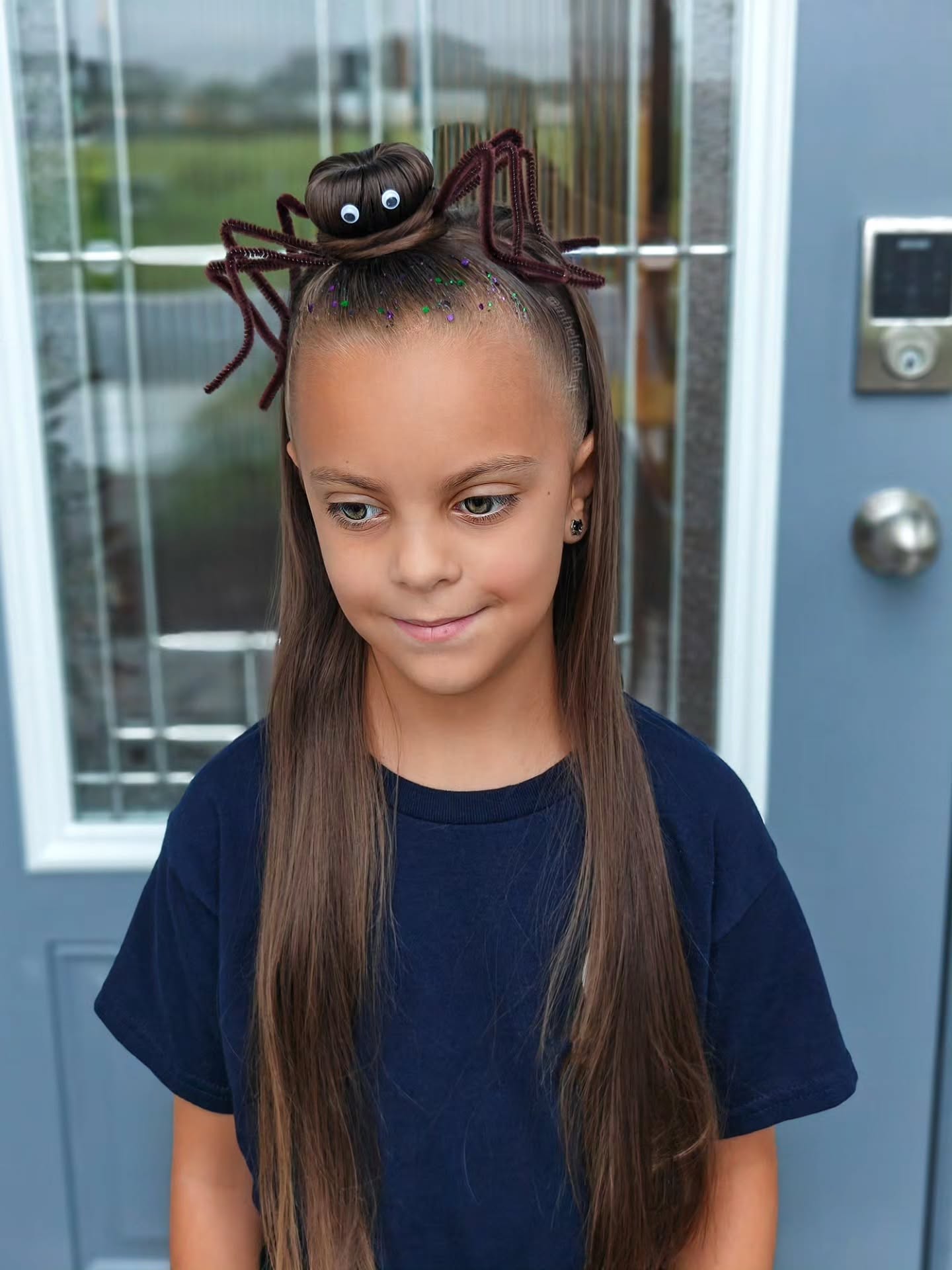 25 Spooktacular Halloween Hairstyles You Need to Try in 2026 21 Spider Surprise Half-Up Bun Halloween Hairstyle
