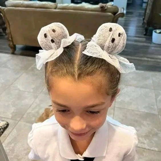 27 Spooktacular Halloween Hairstyles for Kids 2026 21 Spooky Ghost Pigtail Buns For Halloween