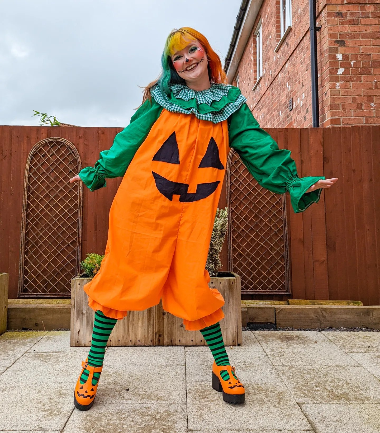 25 Hilarious Halloween Costumes for 2026 You Can’t Miss 17 Spooky Pumpkin Costume With Striped Tights