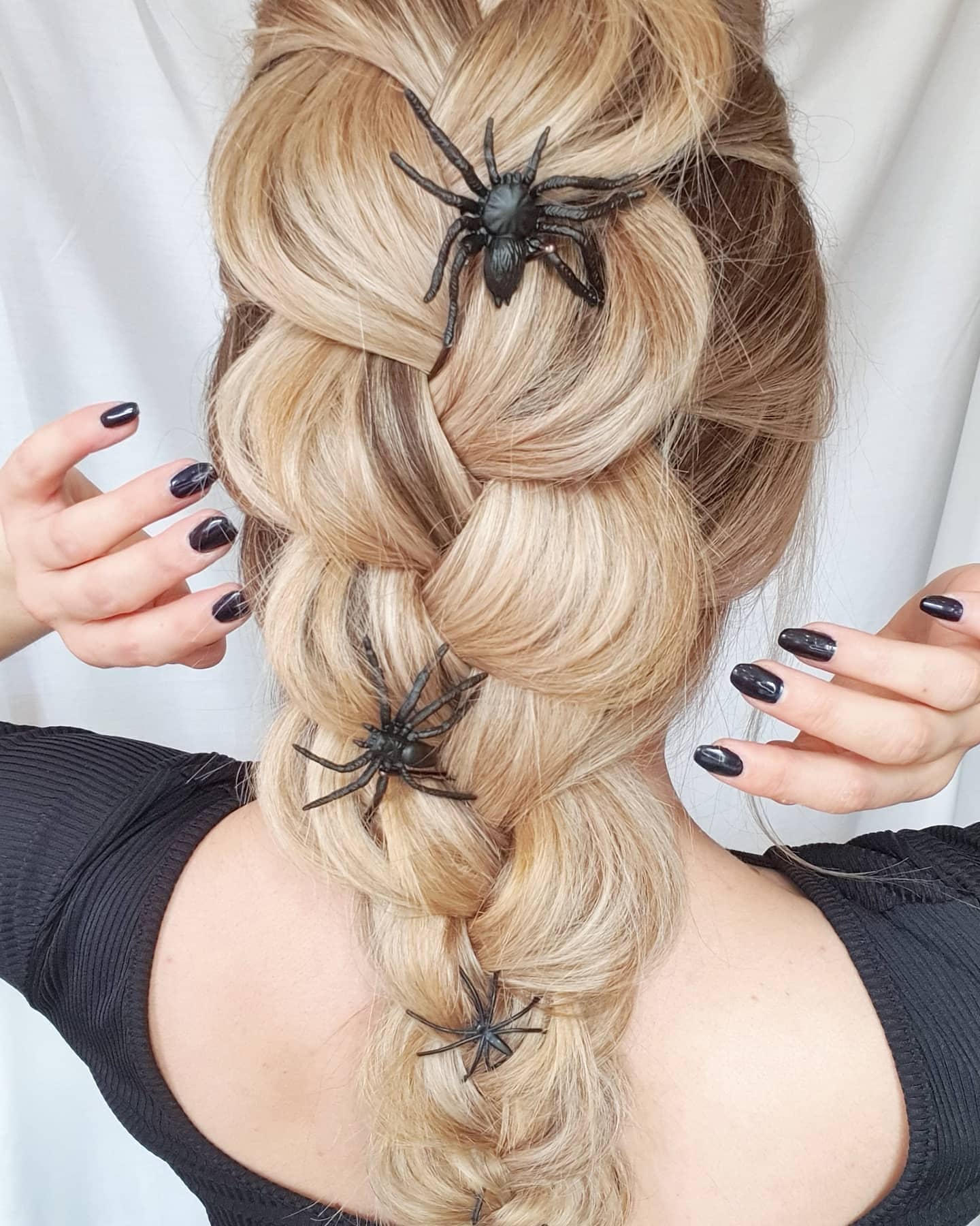 25 Spooktacular Halloween Hairstyles You Need to Try in 2026 18 Spooky Spider Accent Dutch Braid