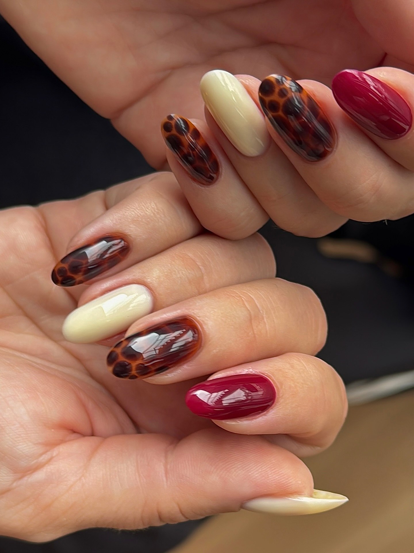 Tortoiseshell Almond Nails with Cream and Burgundy Accents