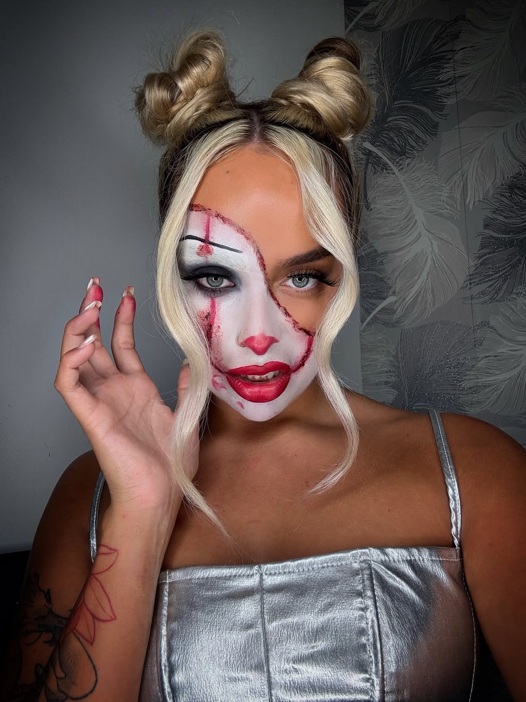 25 Spooktacular Halloween Hairstyles You Need to Try in 2026 5 Twisted Clown Space Buns With Platinum Streaks