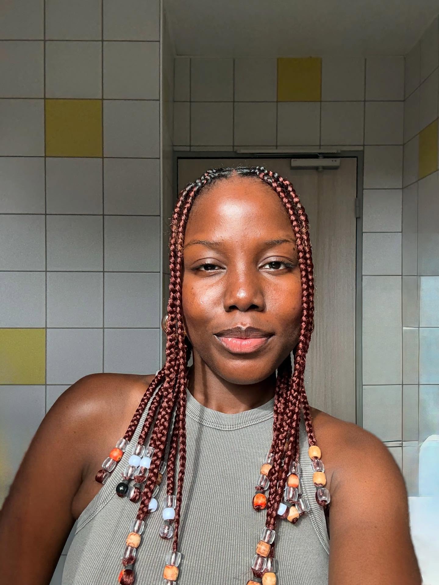 25 Stunning Type 4c Hairstyles You’ll See Everywhere in 2026 8 Type 4C Braids with Mixed Beads