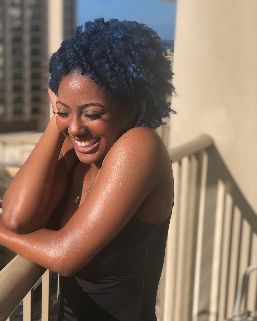 25 Stunning Type 4c Hairstyles You’ll See Everywhere in 2026 23 Vibrant Blue Afro With Defined Coils